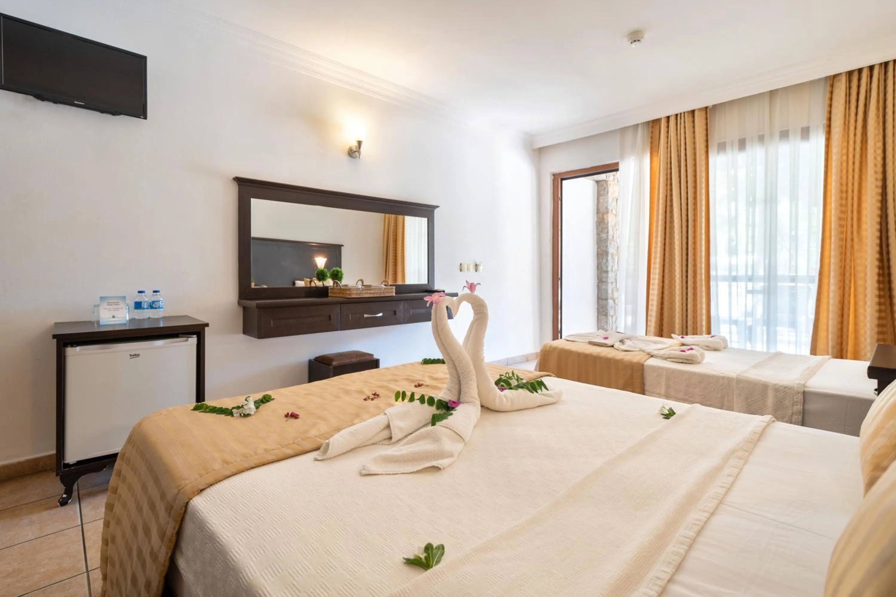 Bed in Ata Lagoon Beach Hotel