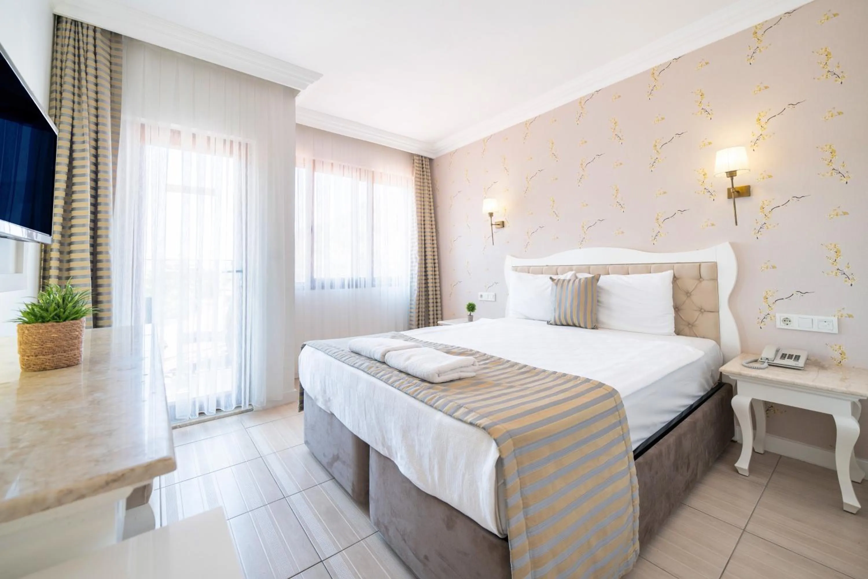 Photo of the whole room, Bed in Ata Lagoon Beach Hotel