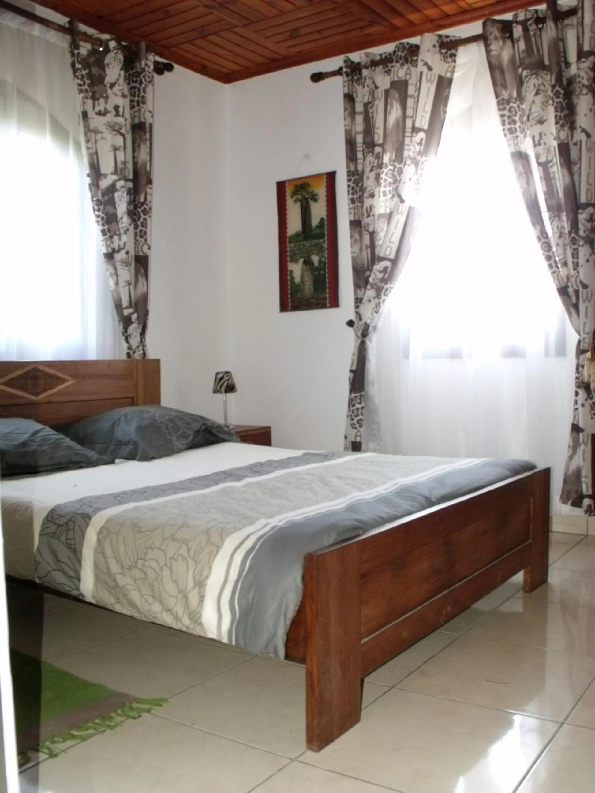 Photo of the whole room, Bed in Iarimbato Hotel