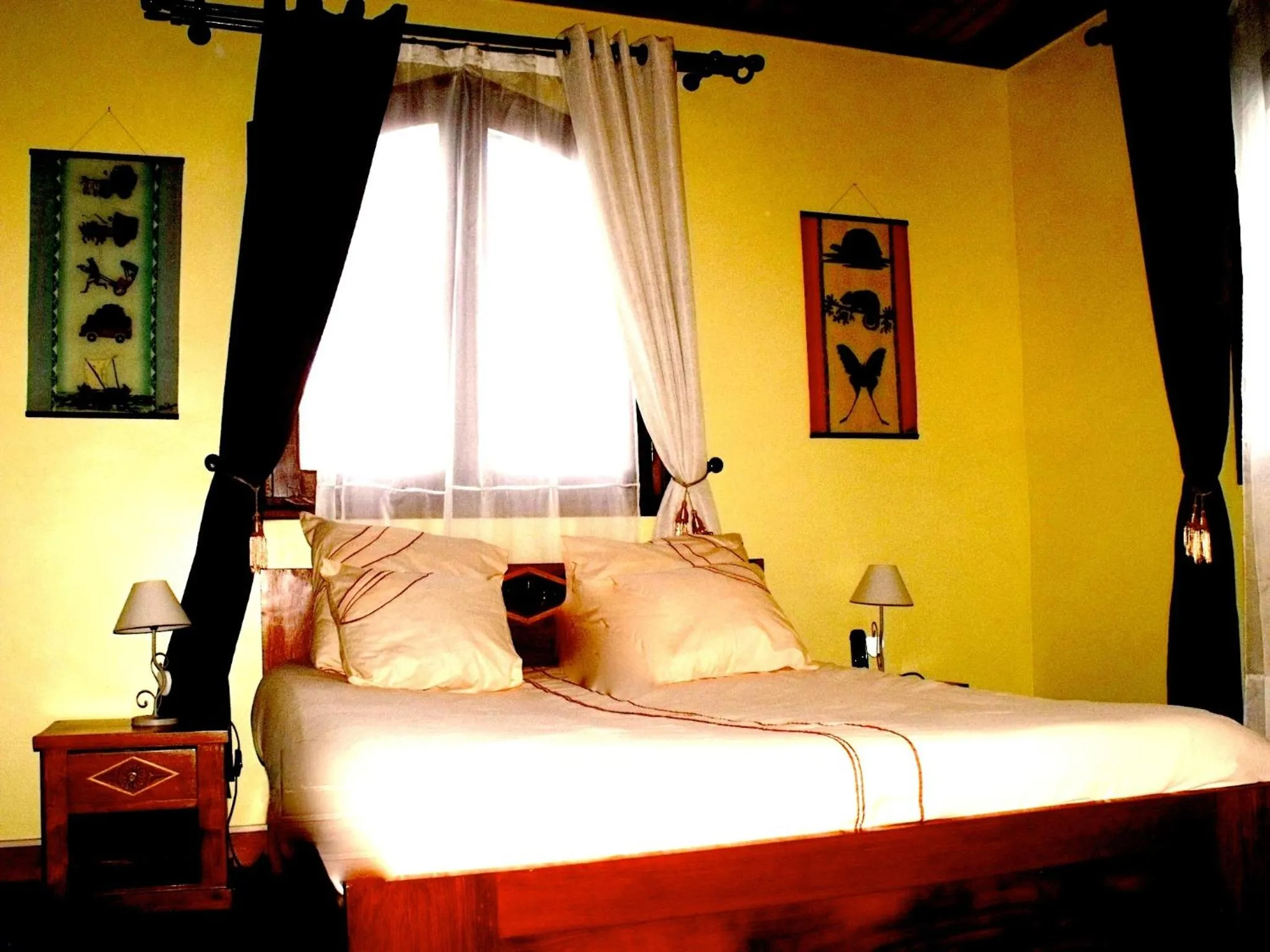 Photo of the whole room, Bed in Iarimbato Hotel