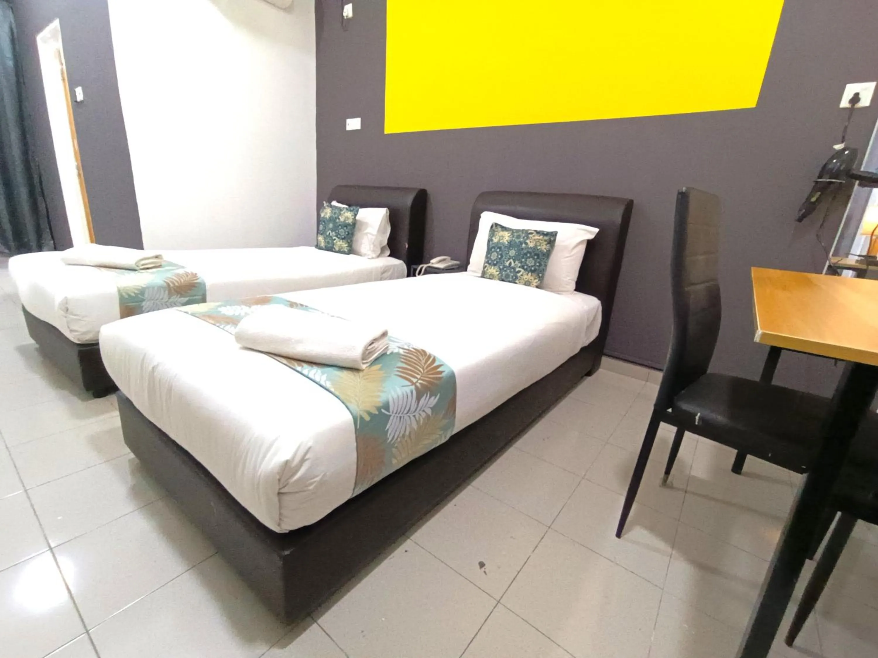 Bed in Salaam Suites Hotel