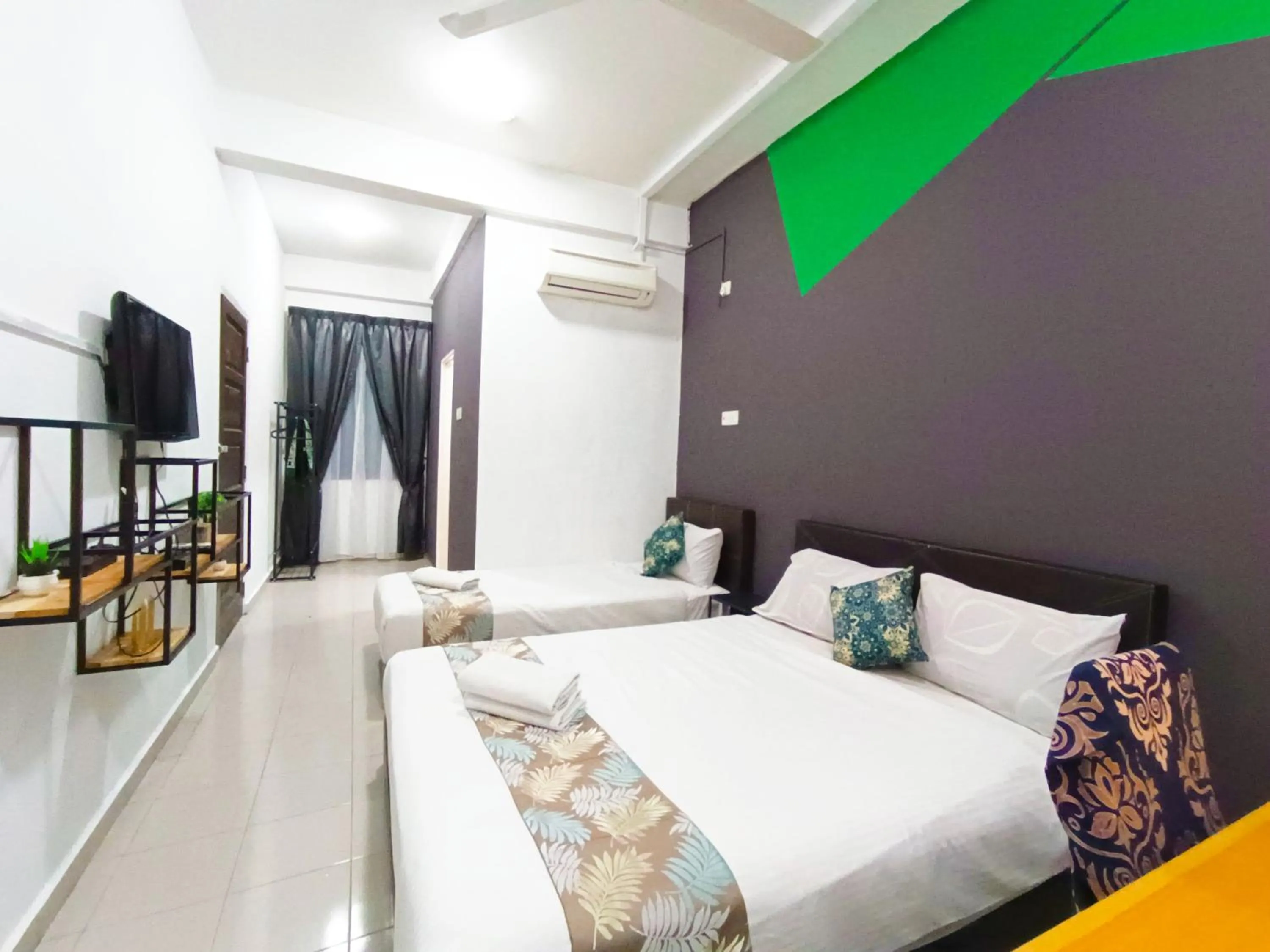 Bed in Salaam Suites Hotel