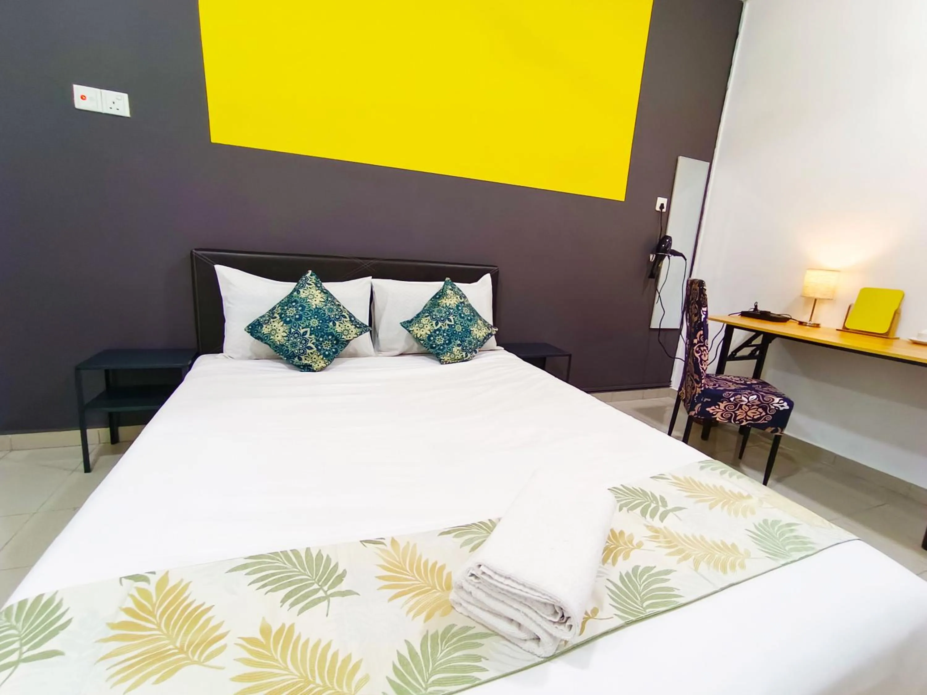 Bed in Salaam Suites Hotel