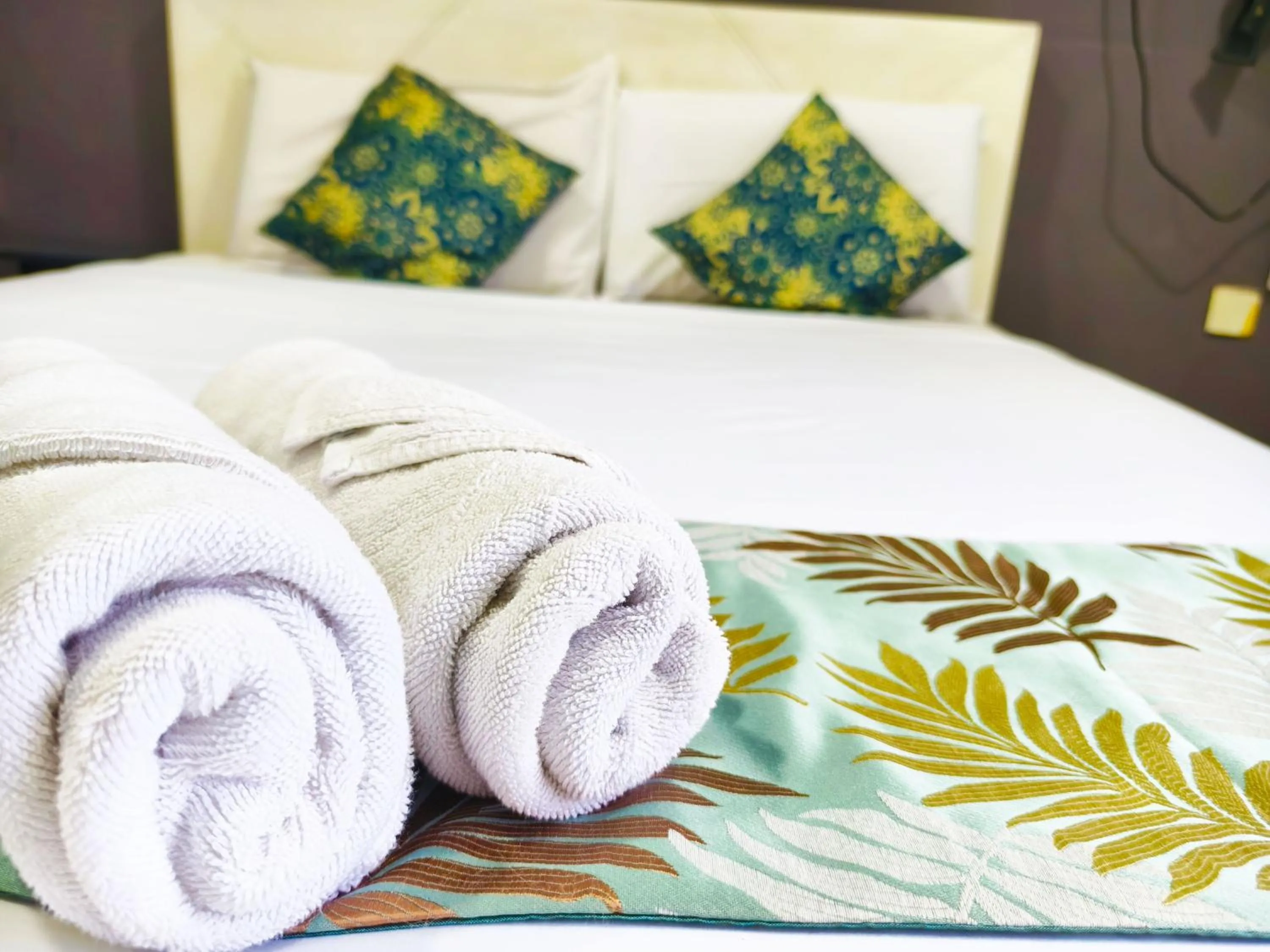 Bed in Salaam Suites Hotel