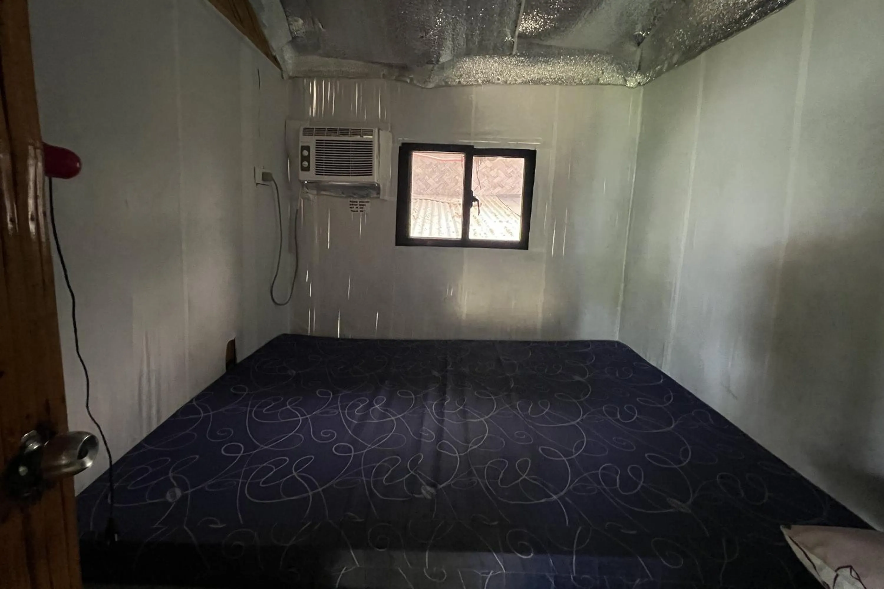 Bedroom in Lover's Point Beach Front Resort