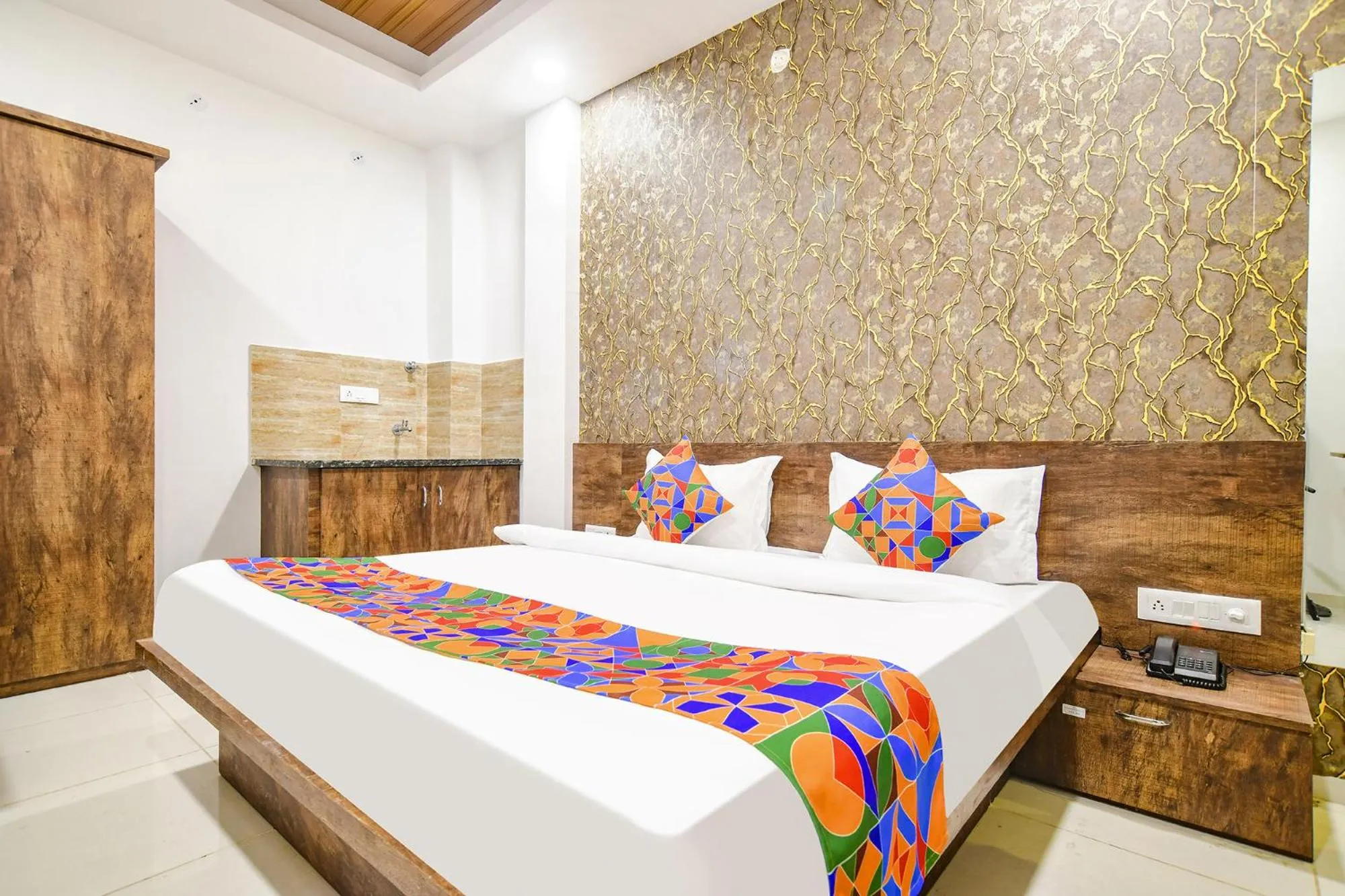 Bed in FabHotel Sage Residency