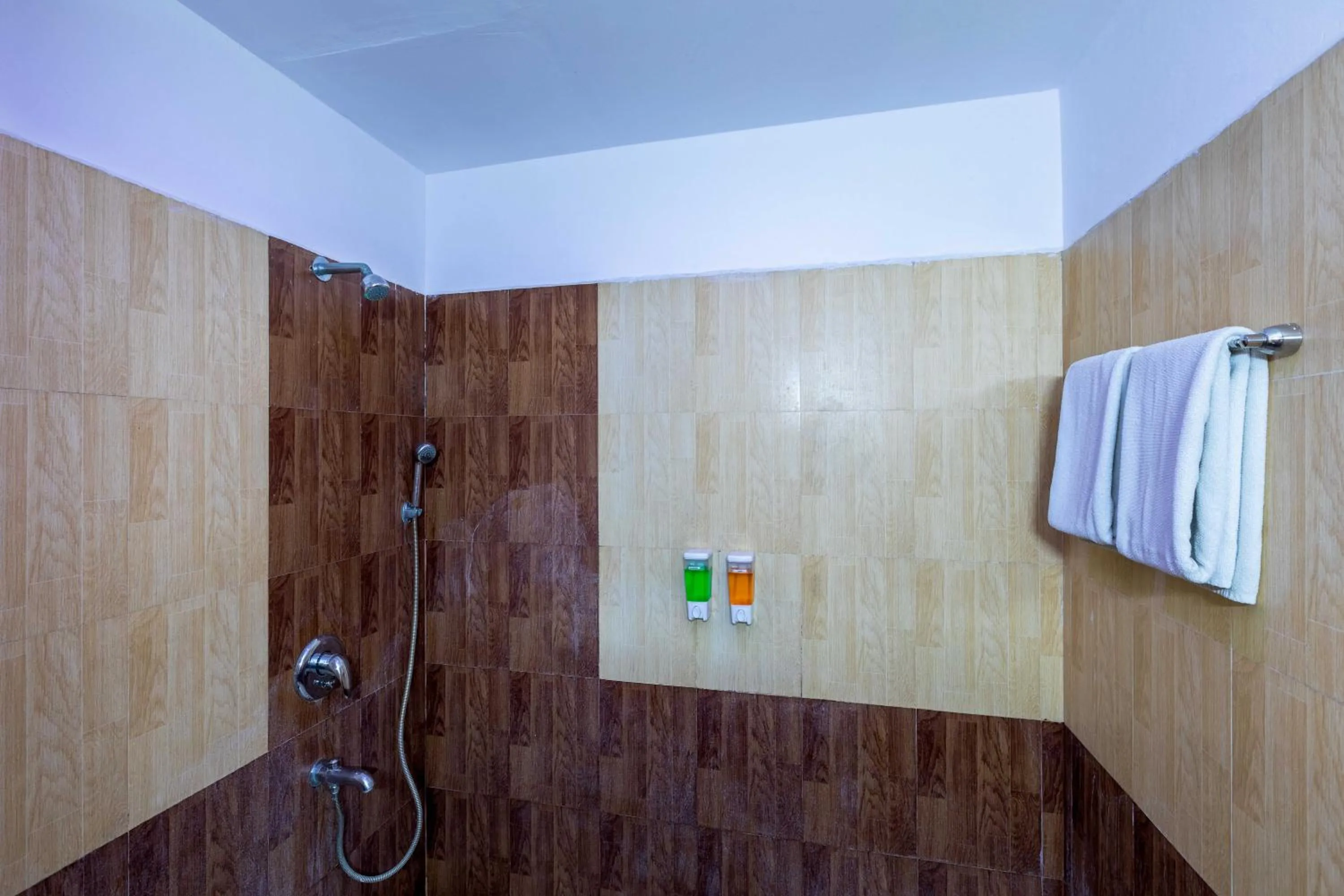 Shower in Blue Bliss Hotels By PPH Living Infantry Road