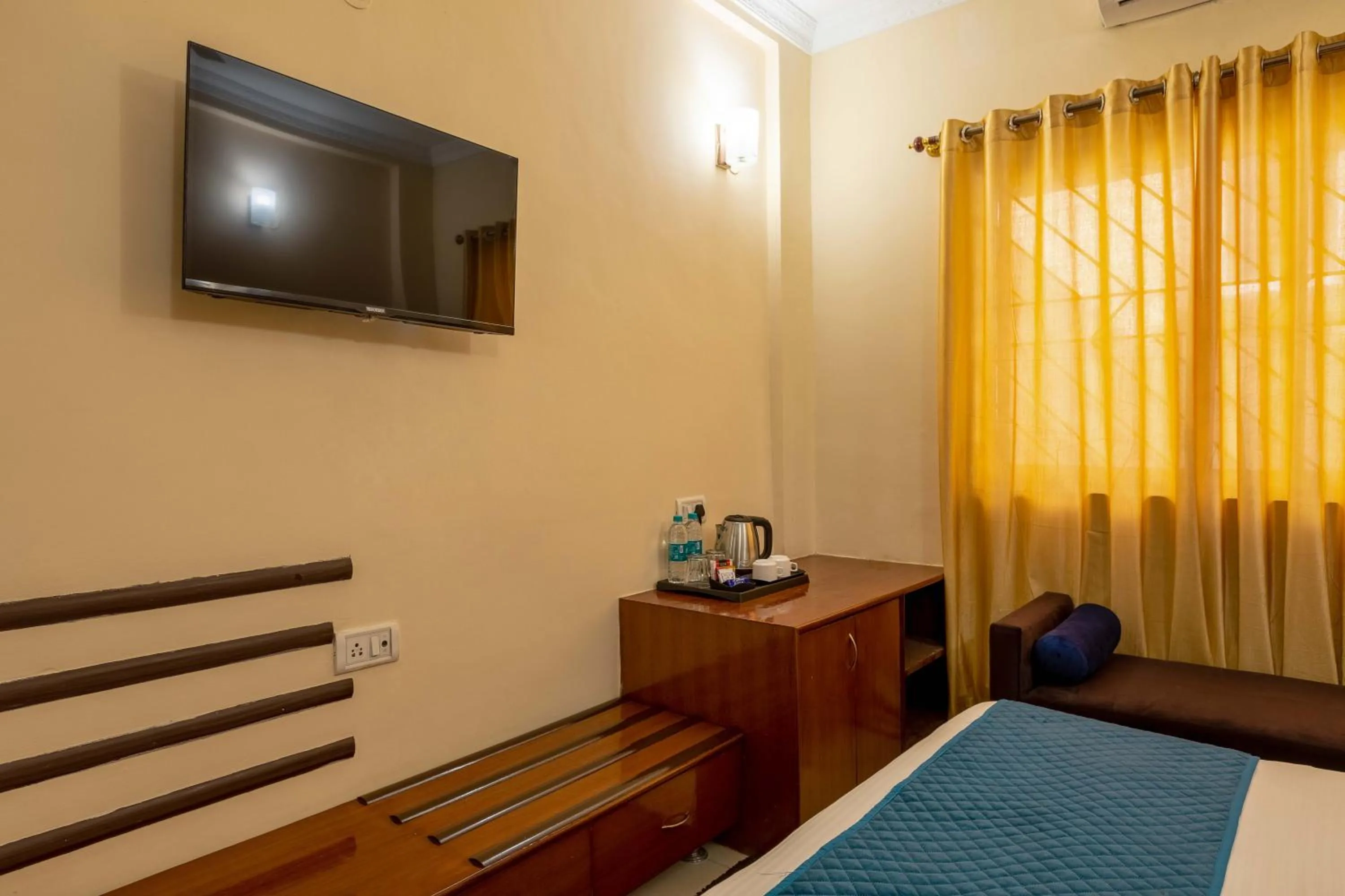 Bedroom, Bed in Blue Bliss Hotels By PPH Living Infantry Road