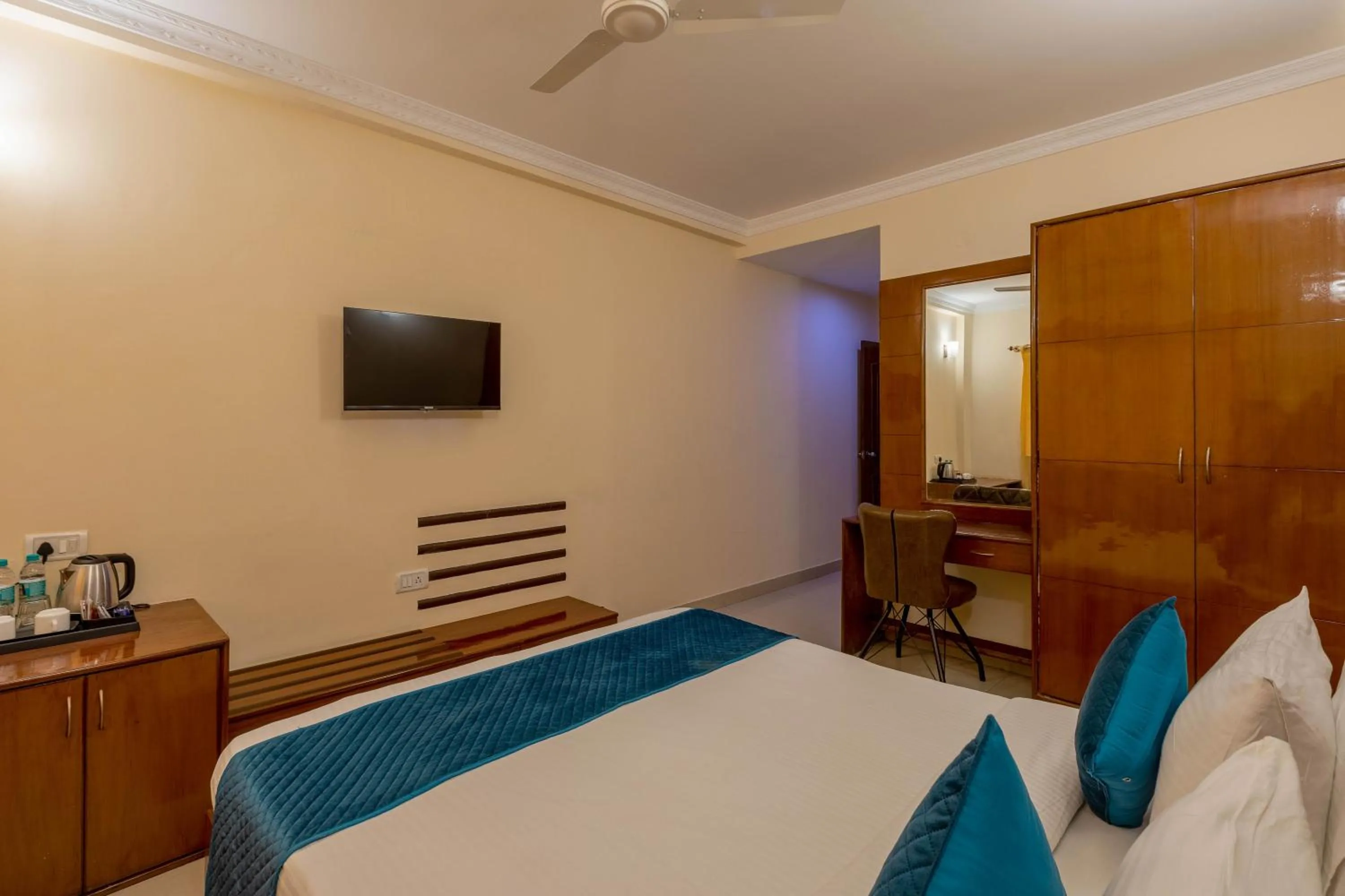 Bedroom, Bed in Blue Bliss Hotels By PPH Living Infantry Road
