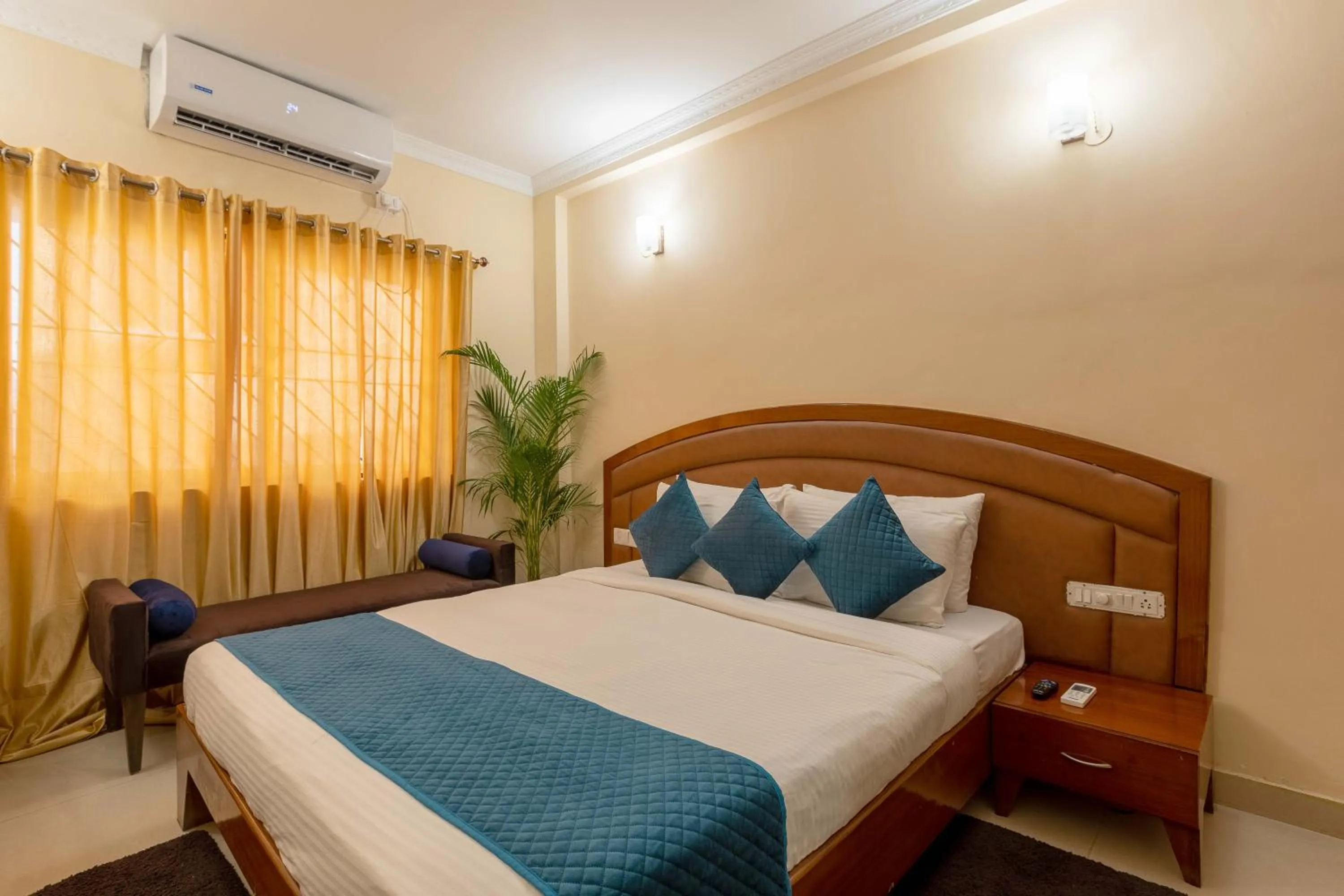 Bedroom, Bed in Blue Bliss Hotels By PPH Living Infantry Road