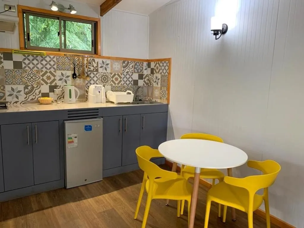 Kitchen or kitchenette in Cabañas Raupa