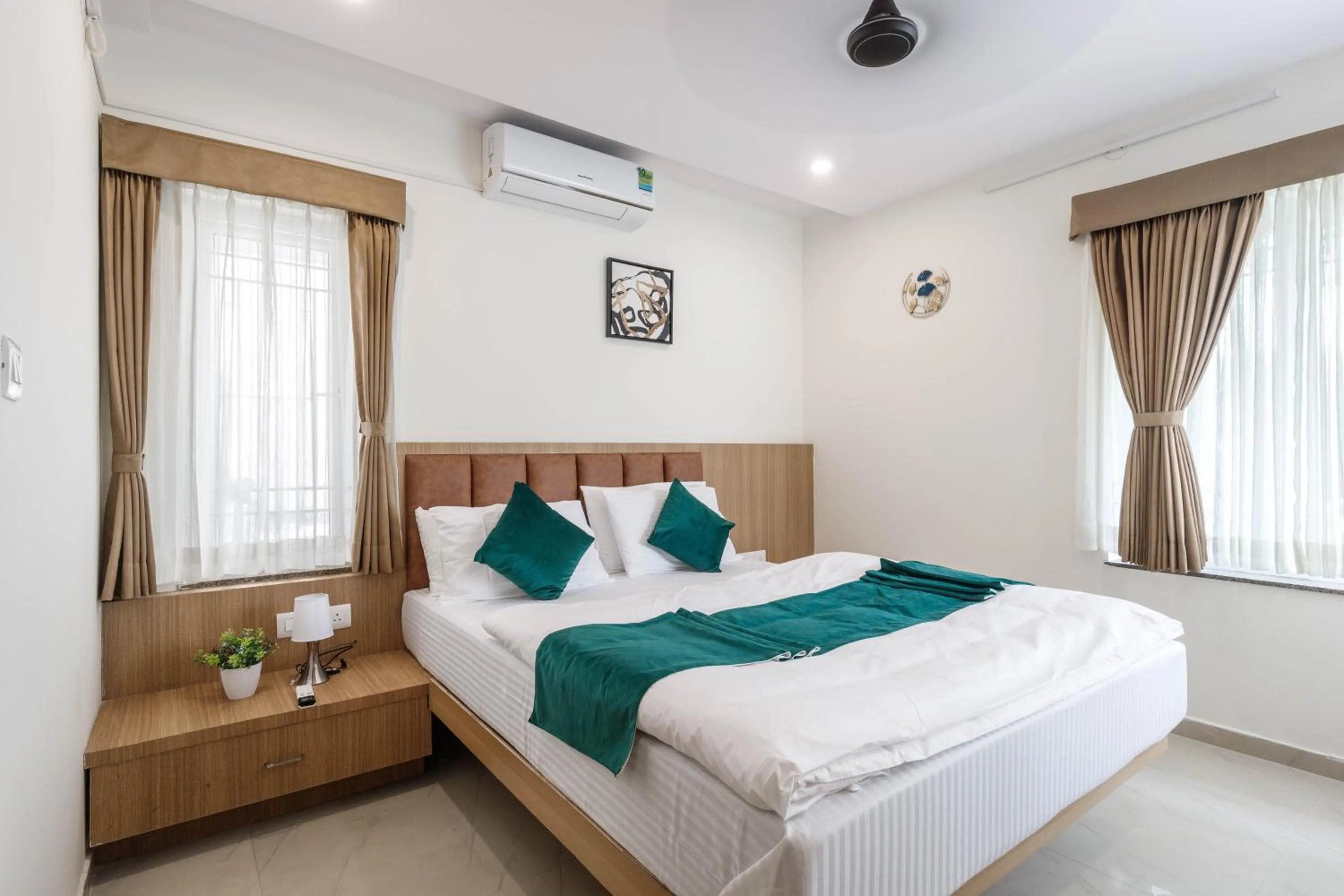 Bed in Sunlight Serviced Apartments