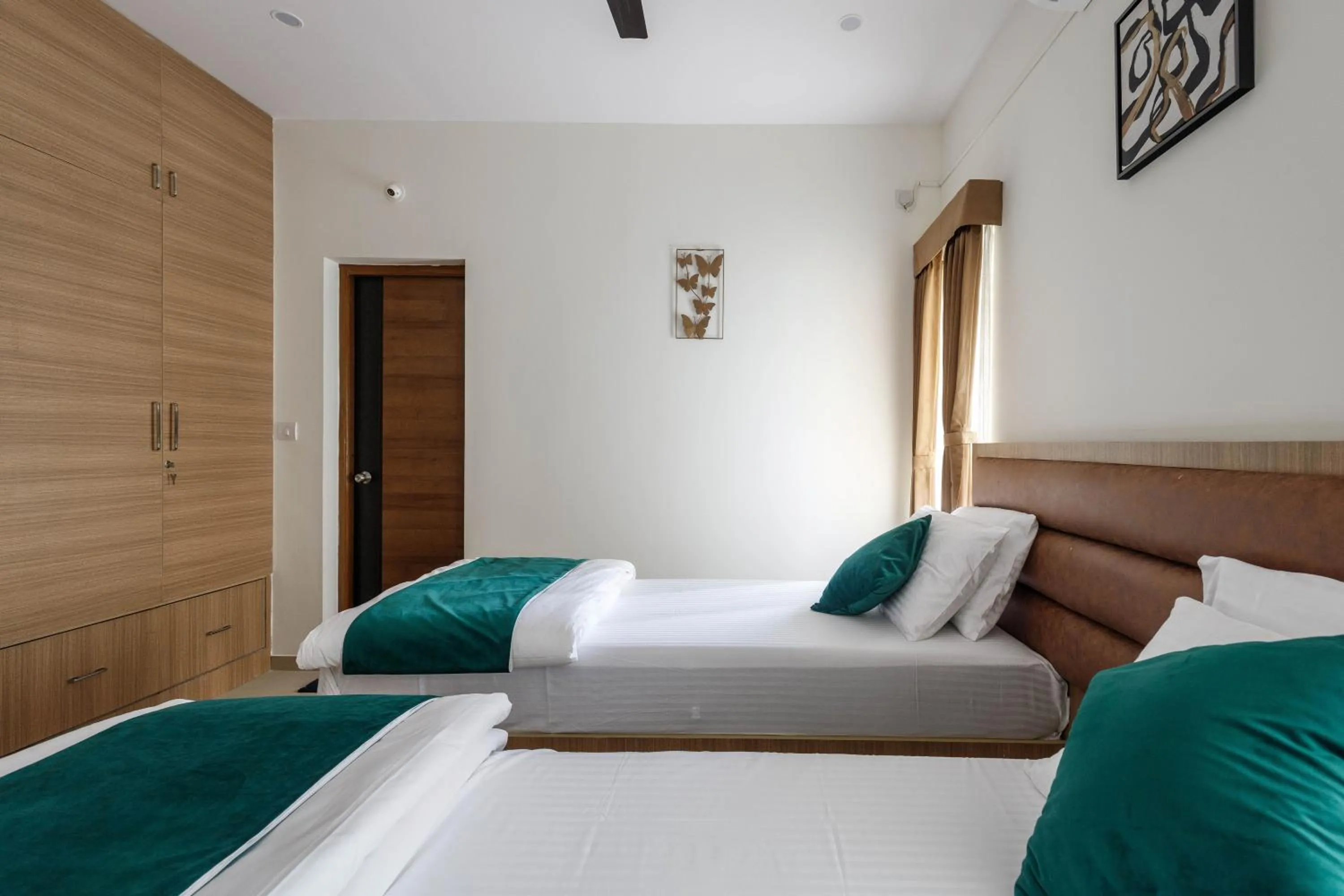 Bed in Sunlight Serviced Apartments