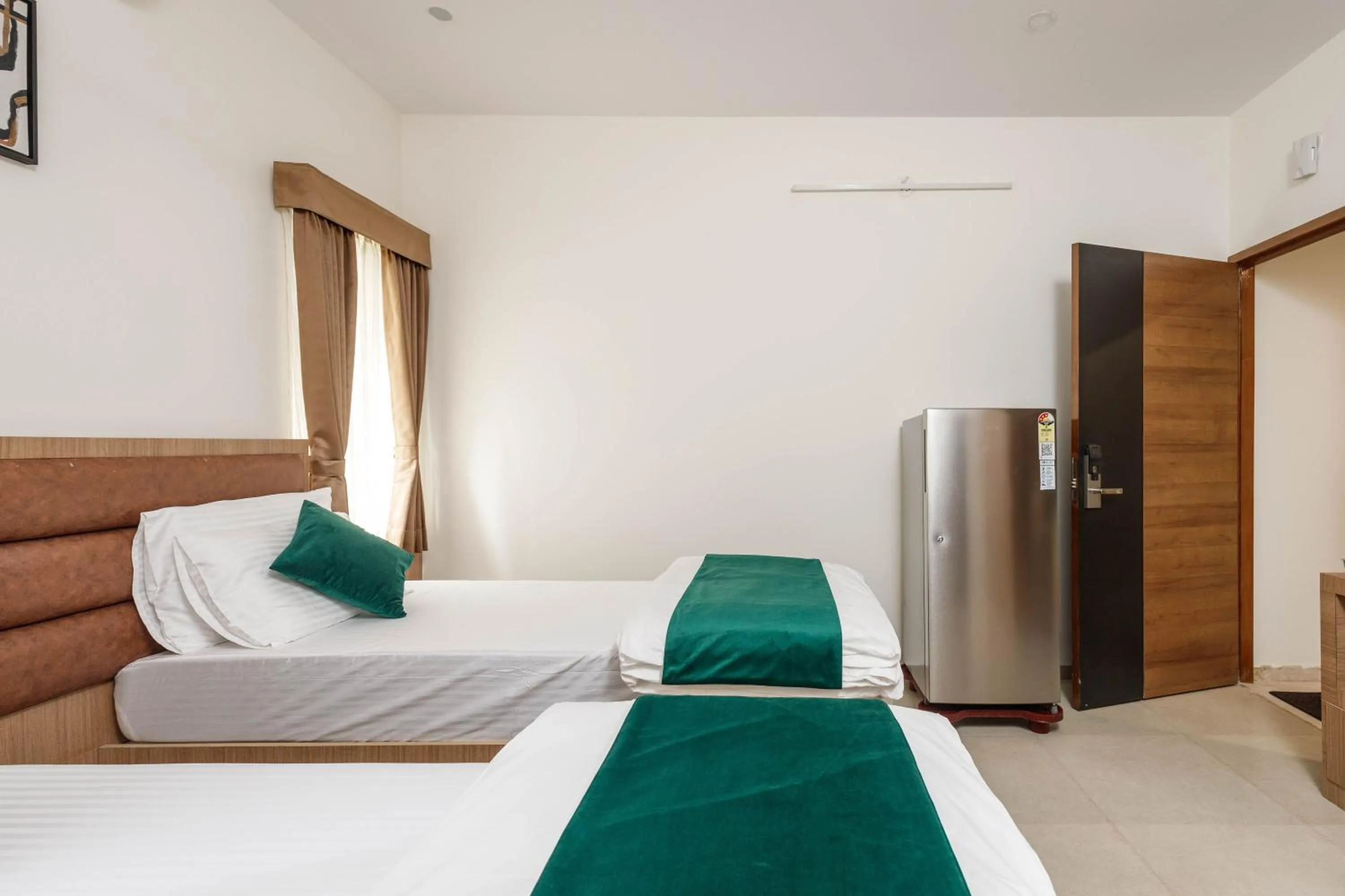 Bed in Sunlight Serviced Apartments