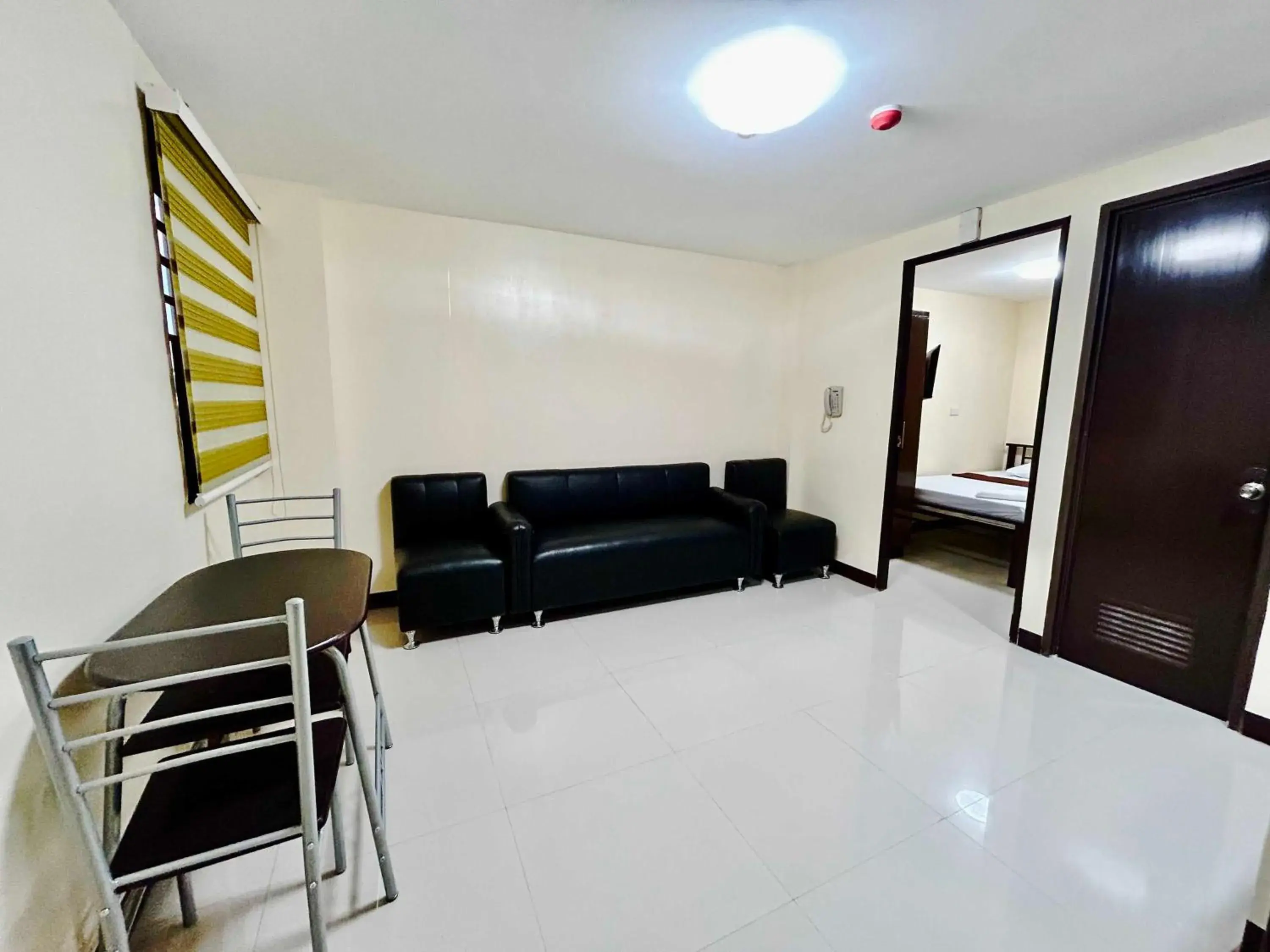 Bedroom in OYO 1045 Rayjan Apartelle Bedroom in OYO 1045 Rayjan Apartelle