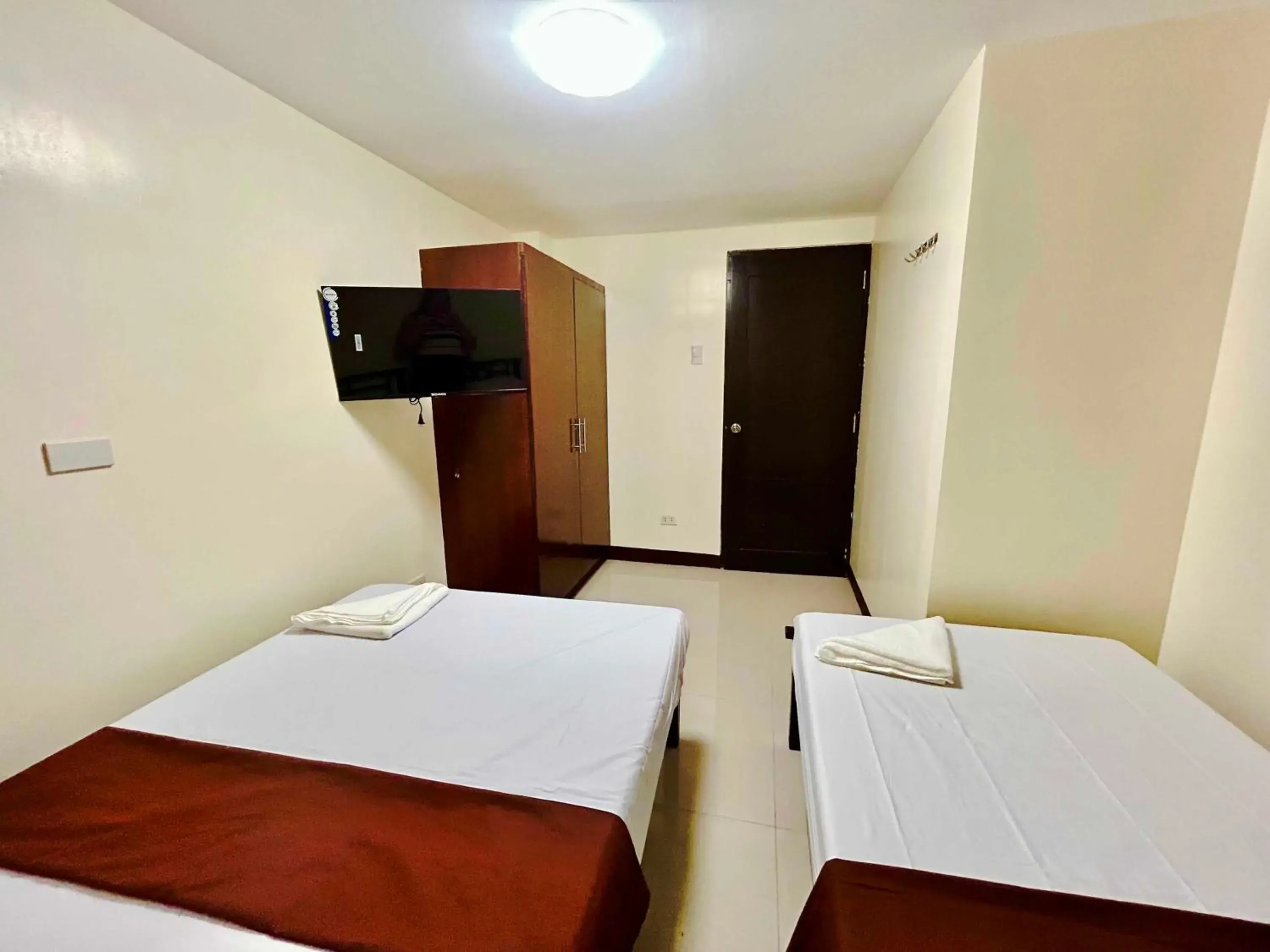 Bedroom, Bed in OYO 1045 Rayjan Apartelle Bedroom, Bed in OYO 1045 Rayjan Apartelle