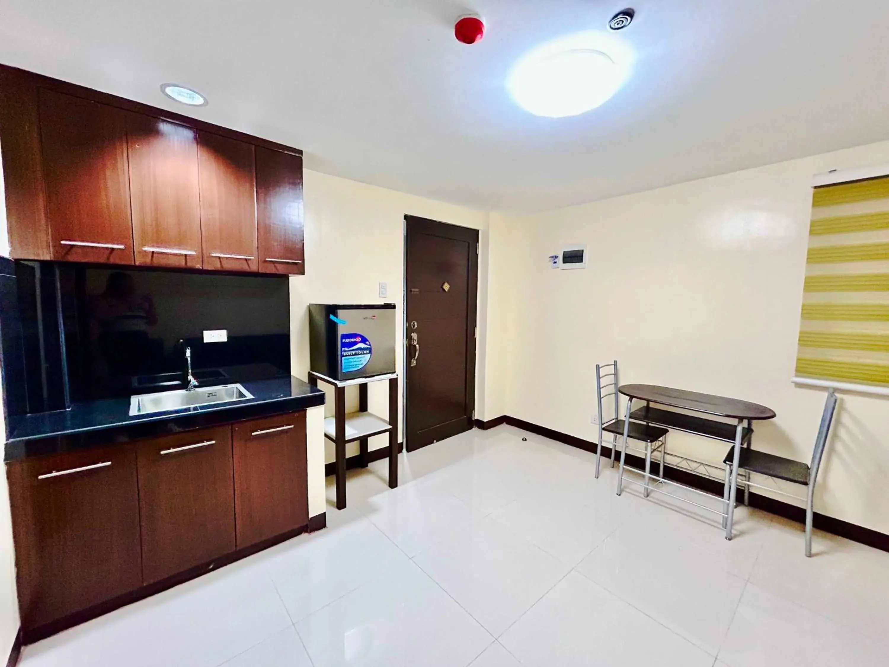 Bedroom in OYO 1045 Rayjan Apartelle Bedroom in OYO 1045 Rayjan Apartelle