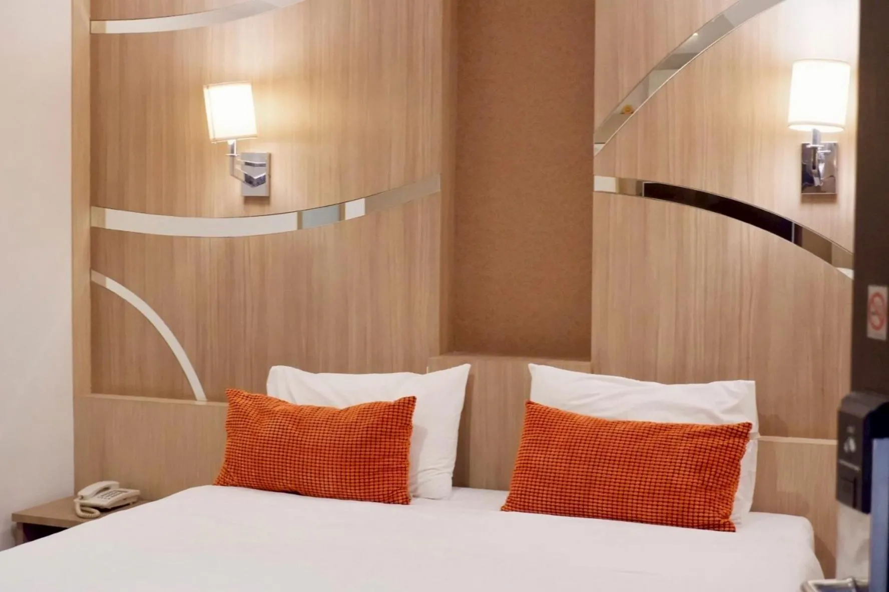 Bed in Delio Boutique Hotel