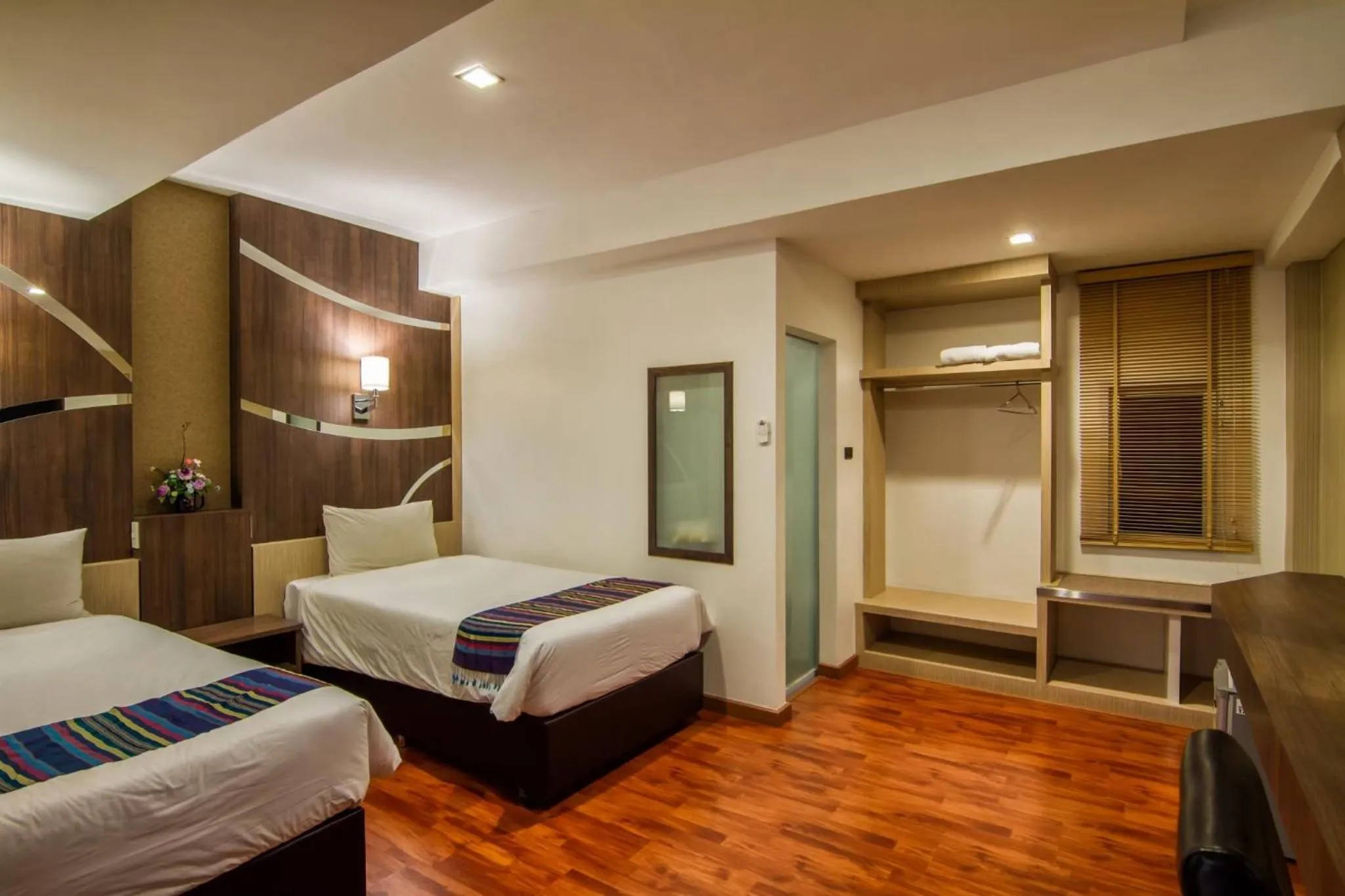 Bed in Delio Boutique Hotel