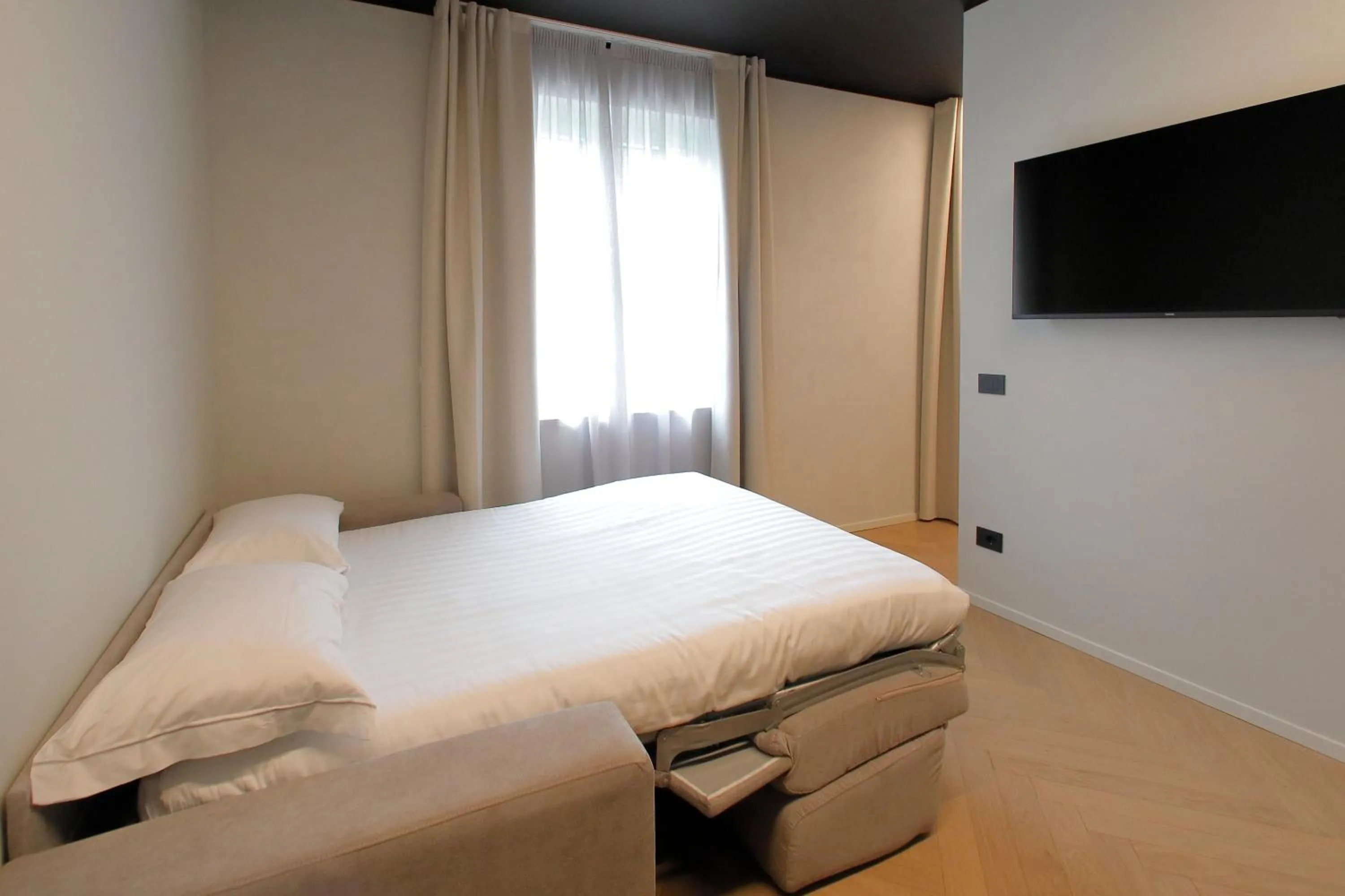 Bed in Hotel Namia by Dori