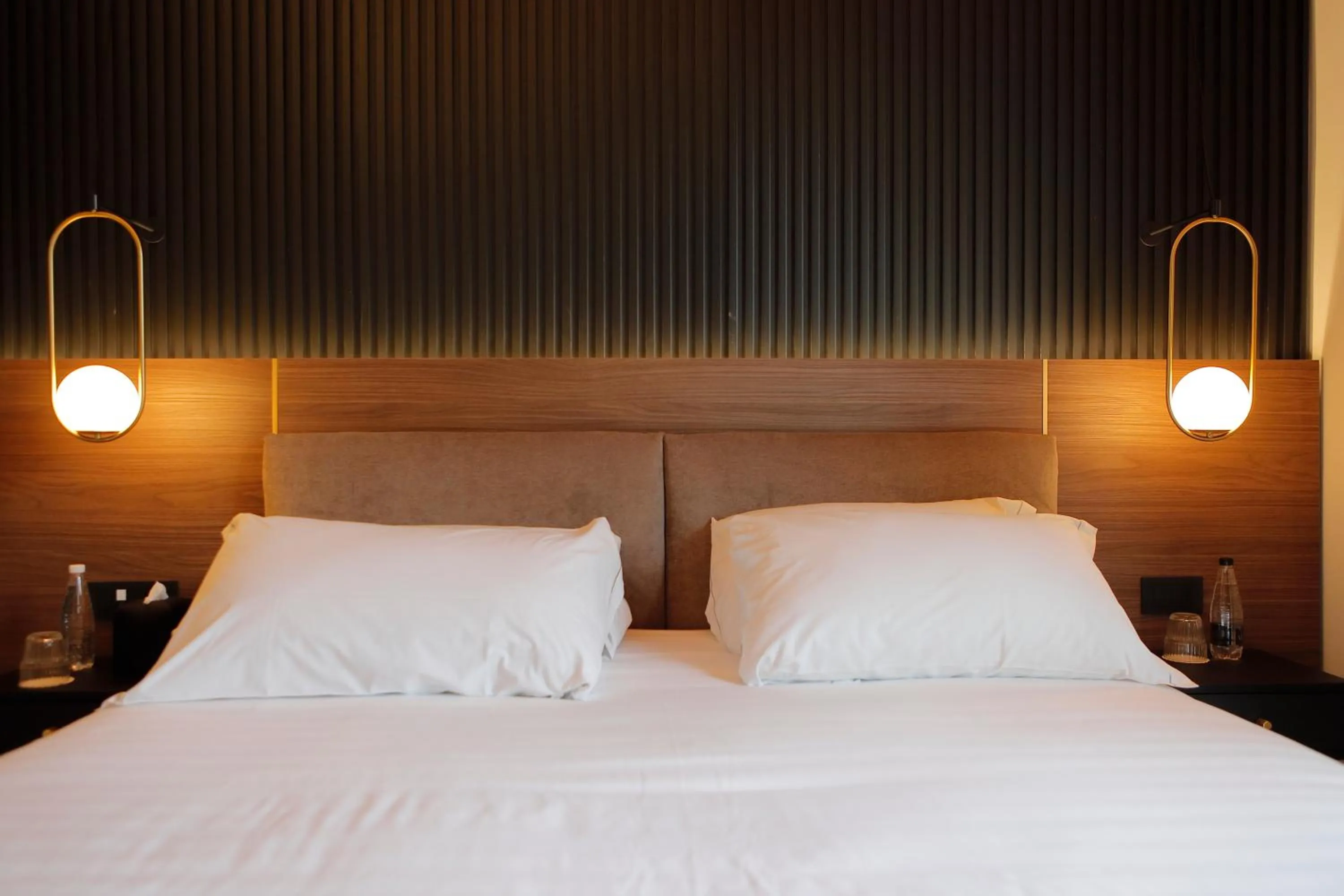 Bed in Hotel Namia by Dori