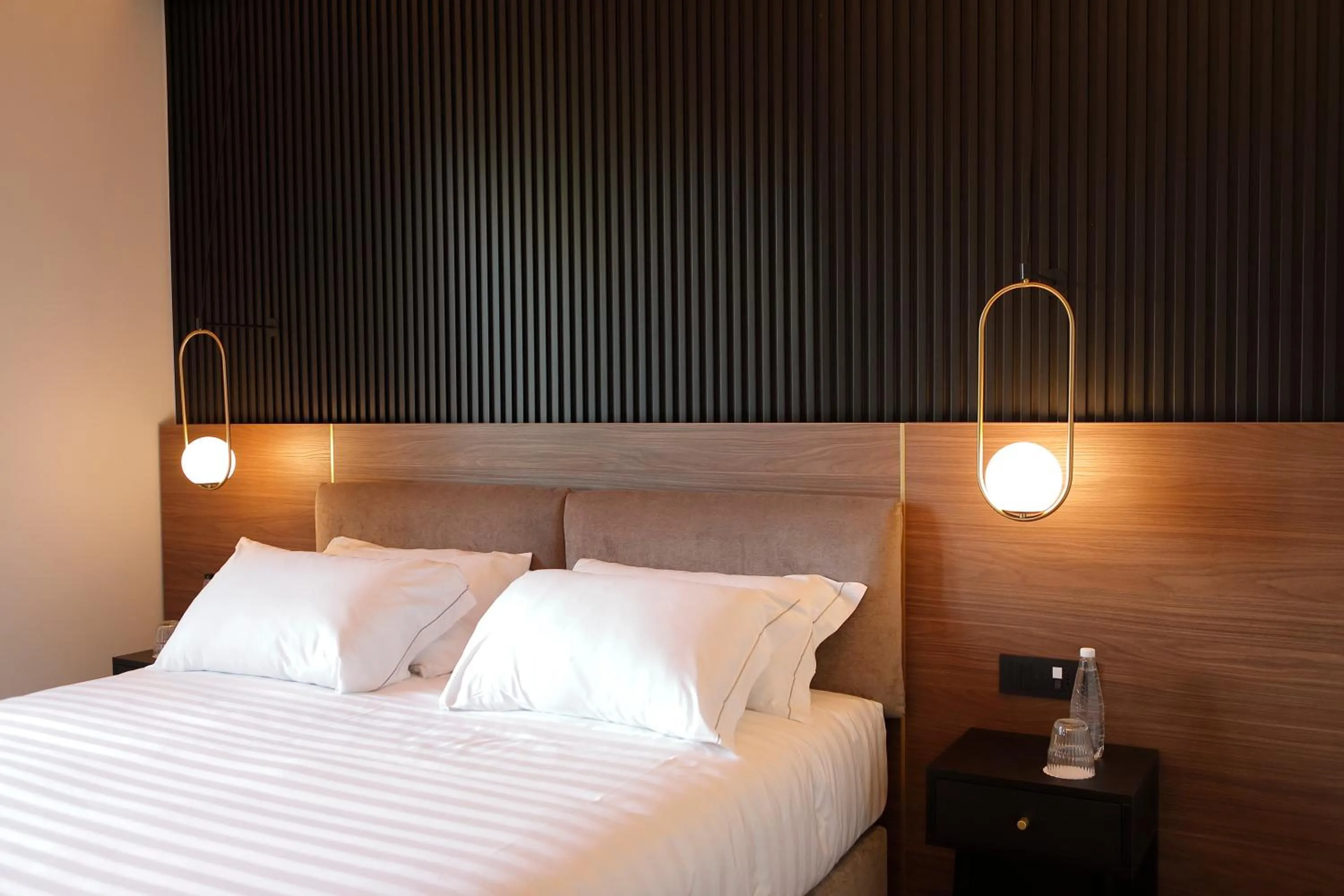 Bed in Hotel Namia by Dori