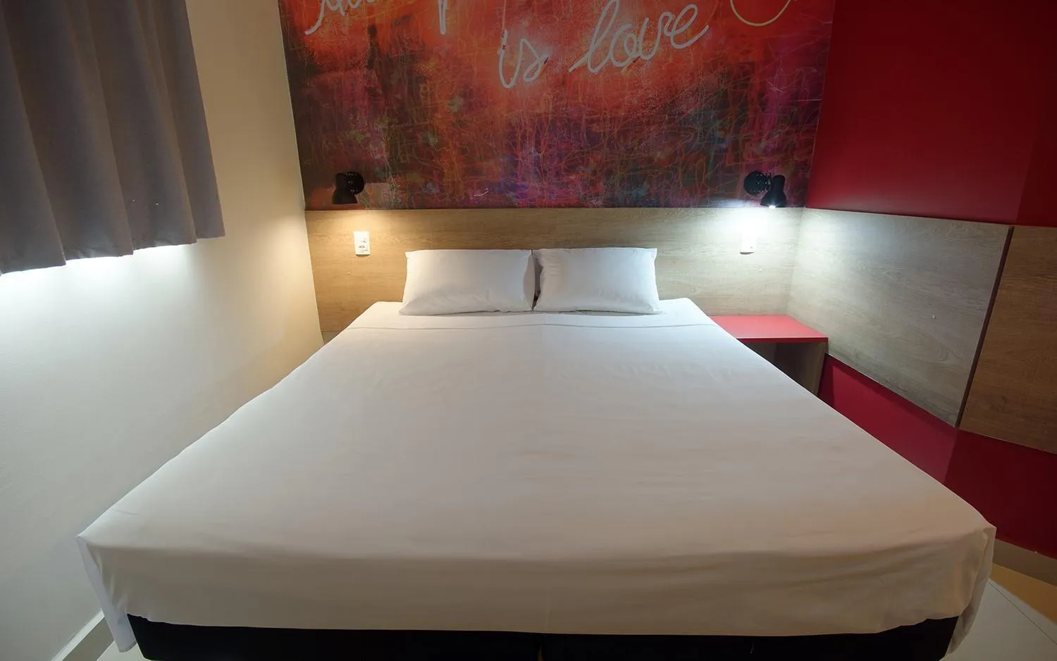 Bed in Golden Tower Express Franca by Fênix Hotéis