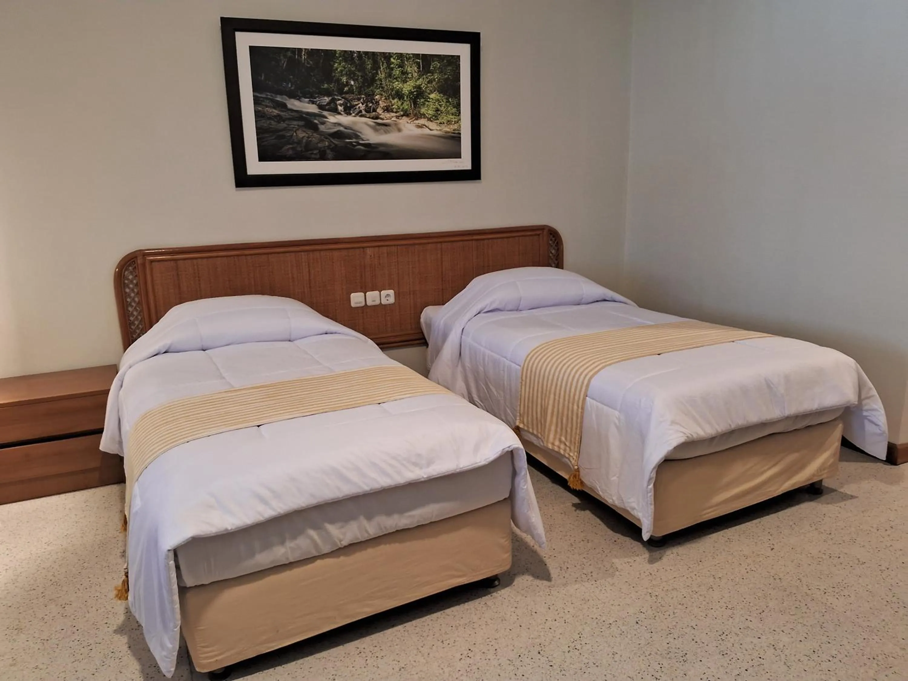 Bed in INDO ALAM RECREATIONAL RESORT