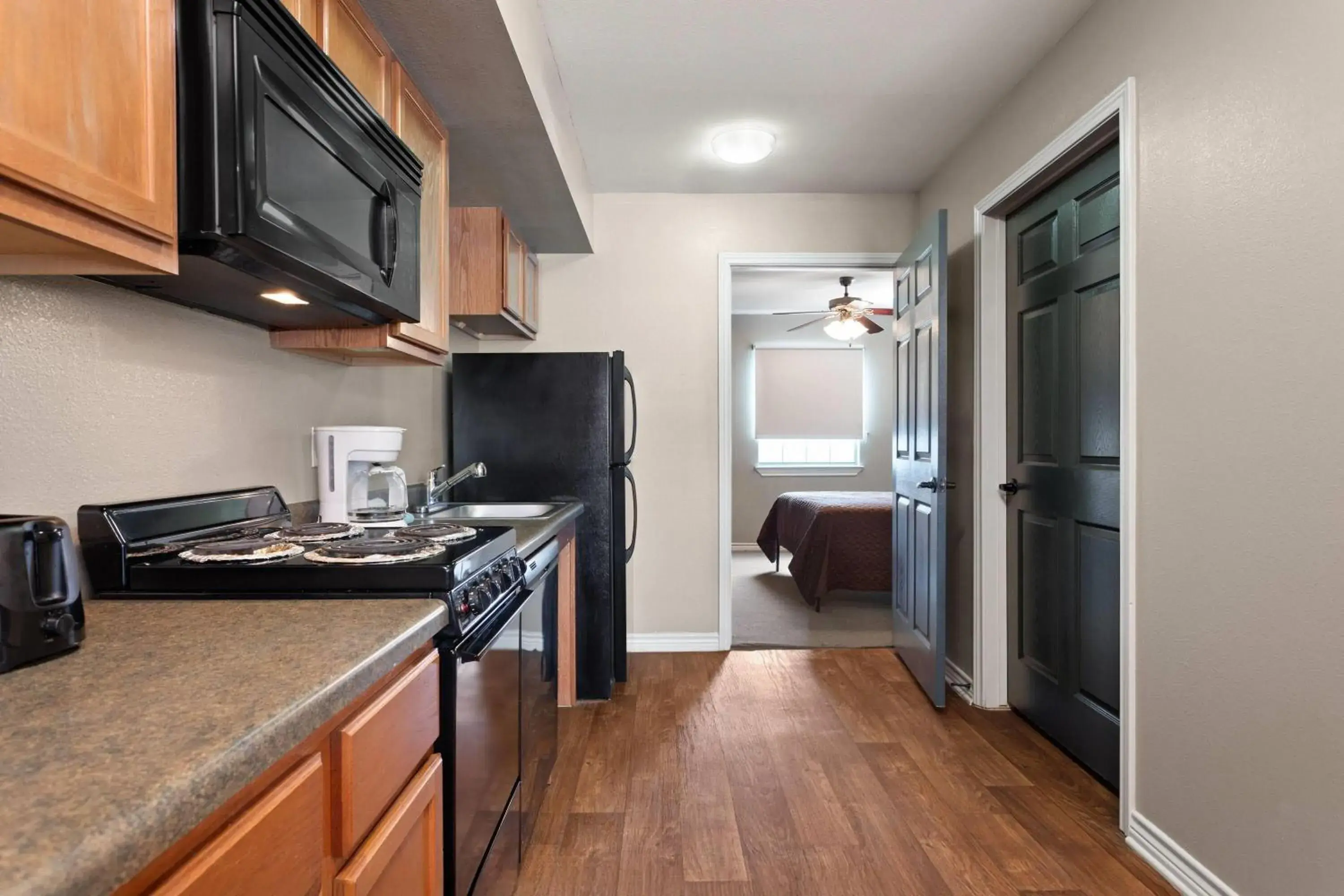 Photo of the whole room in Eagle's Den Suites Carrizo Springs a Travelodge by Wyndham Photo of the whole room in Eagle's Den Suites Carrizo Springs a Travelodge by Wyndham