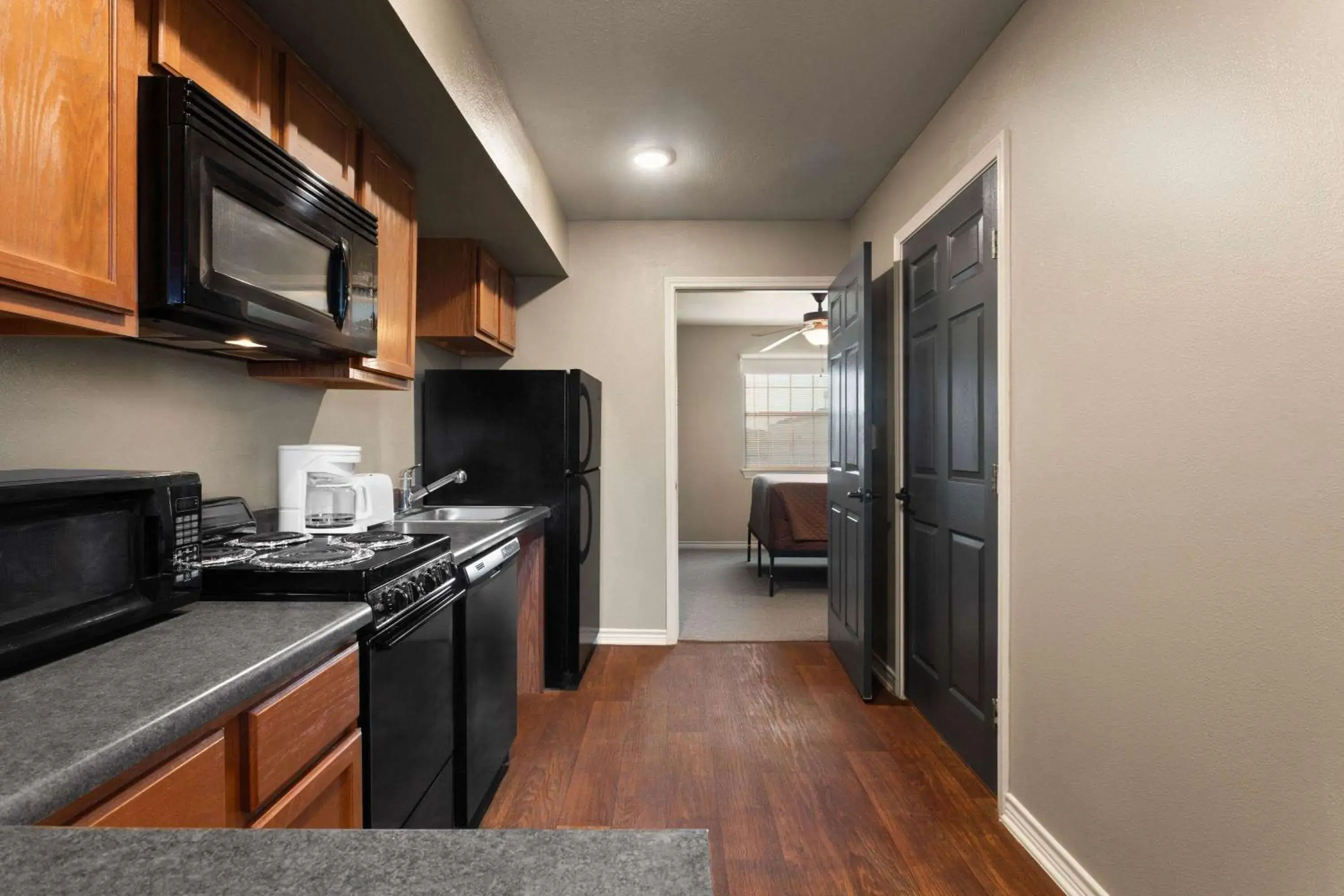 Photo of the whole room in Eagle's Den Suites Cotulla a Travelodge by Wyndham Photo of the whole room in Eagle's Den Suites Cotulla a Travelodge by Wyndham