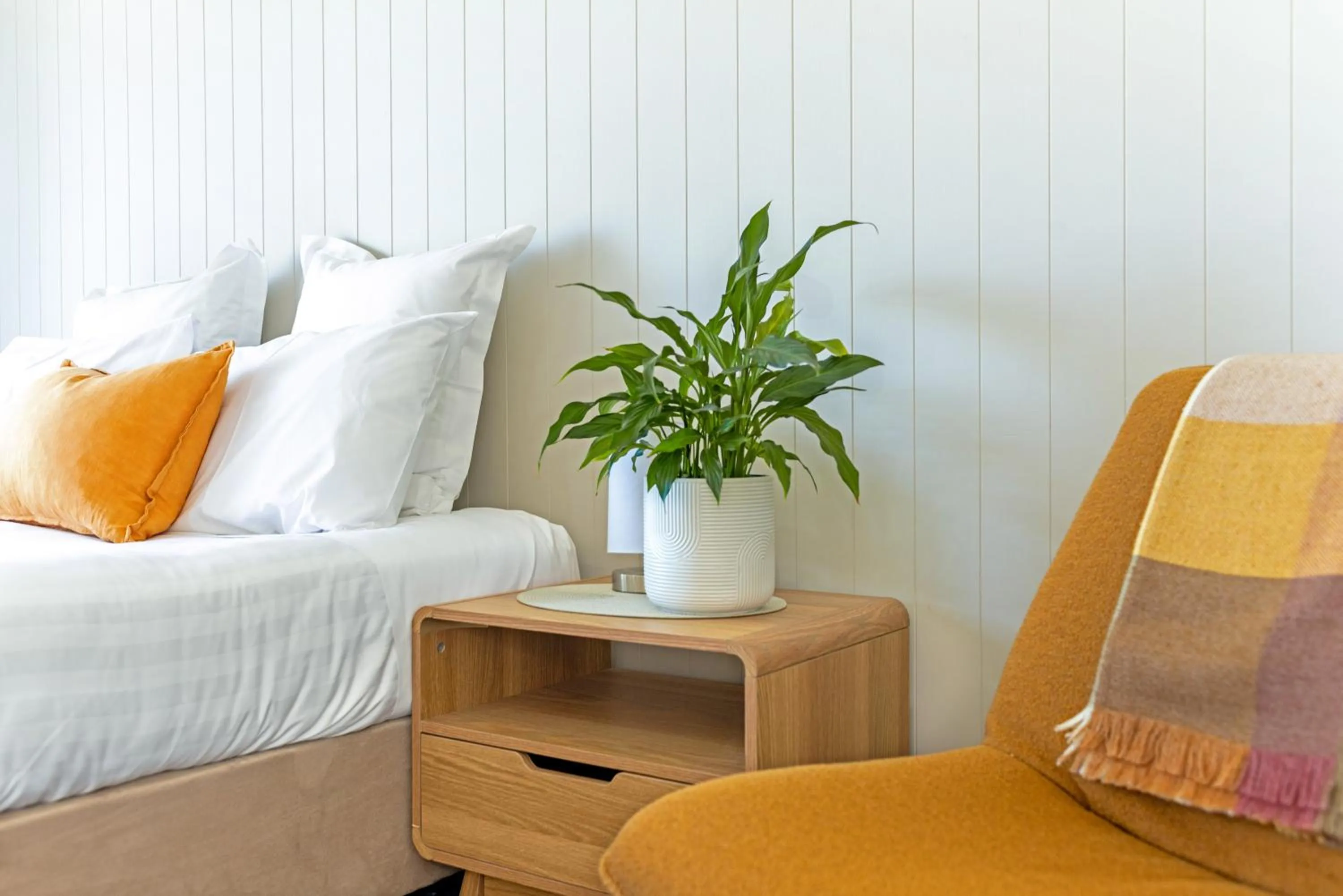 Bed in Whispering Sands Beachfront Motel