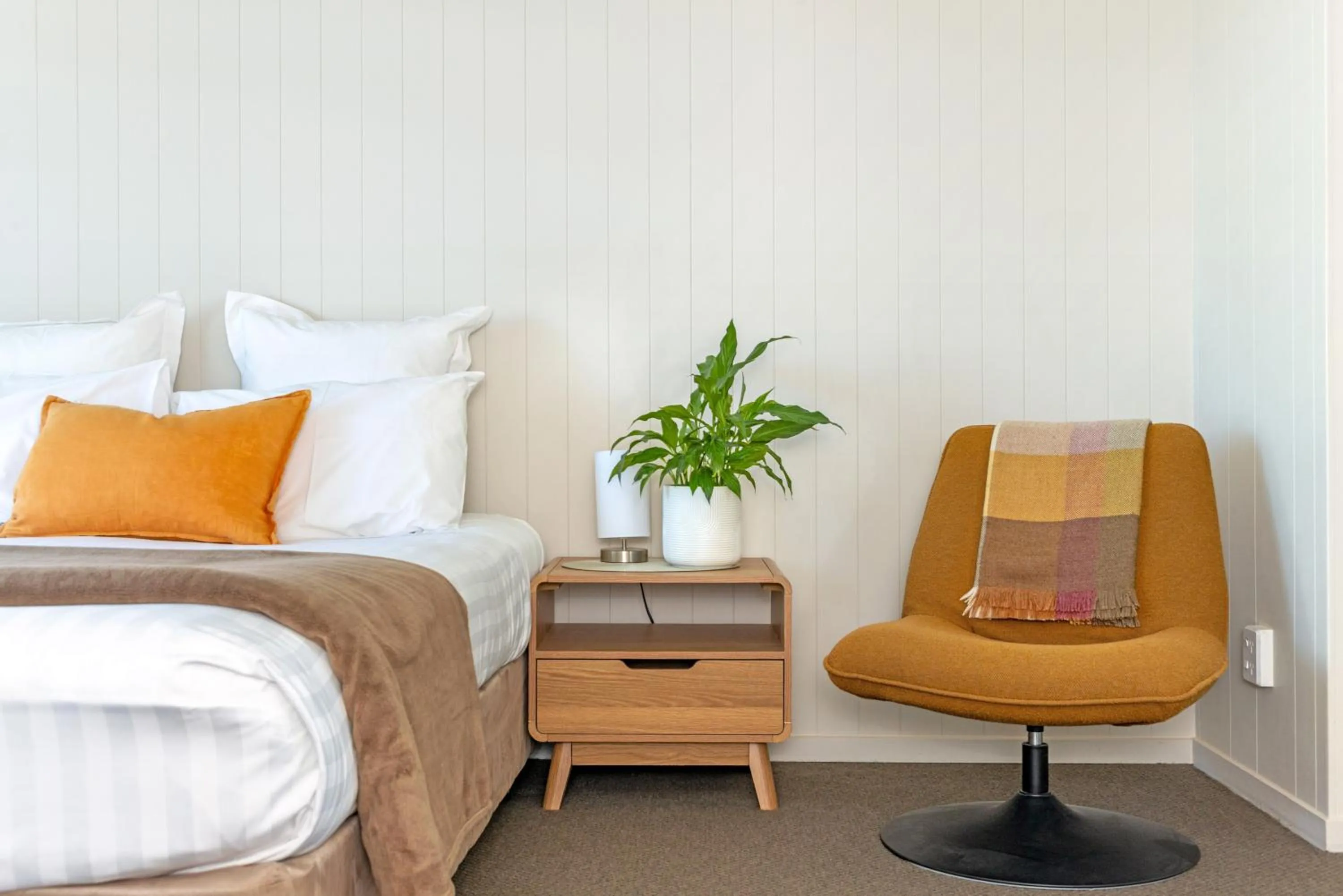 Bed in Whispering Sands Beachfront Motel