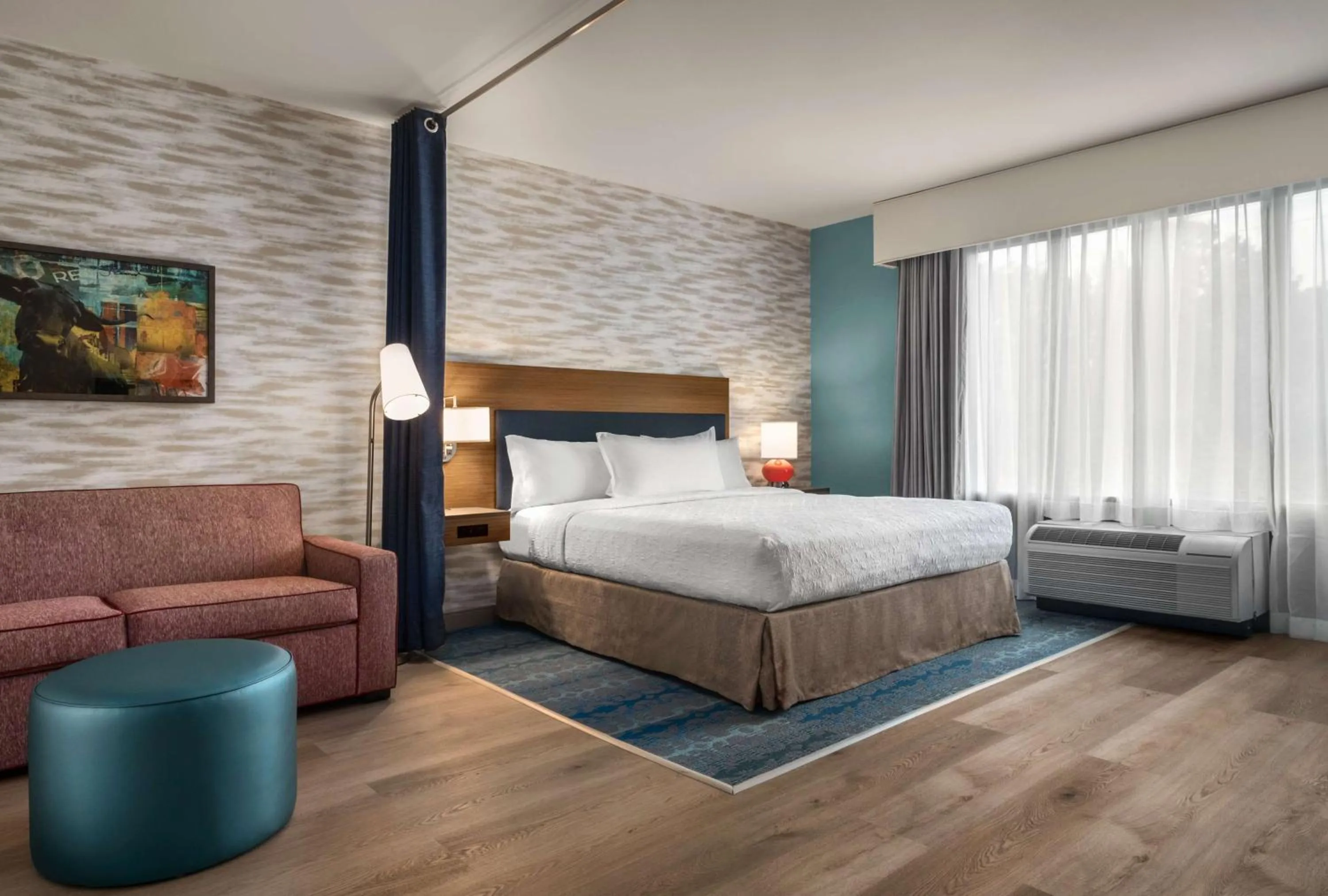 Living room, Bed in Home2 Suites By Hilton East Austin - near Downtown and UT