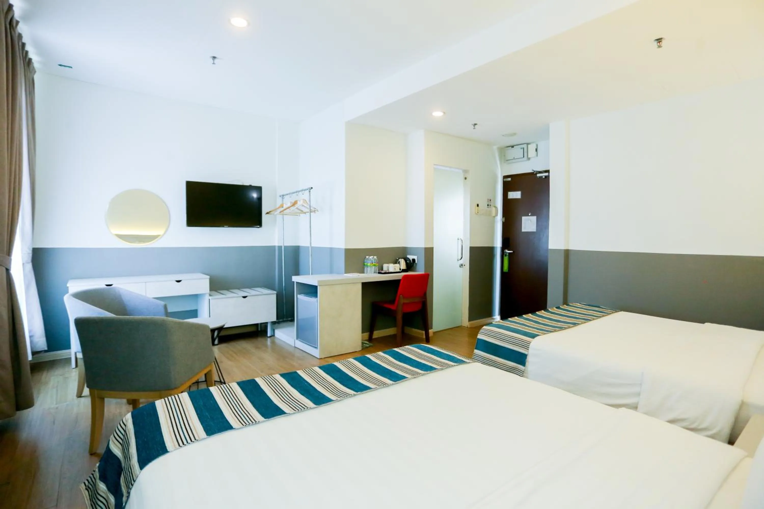 Bed in The Explorer Hotel