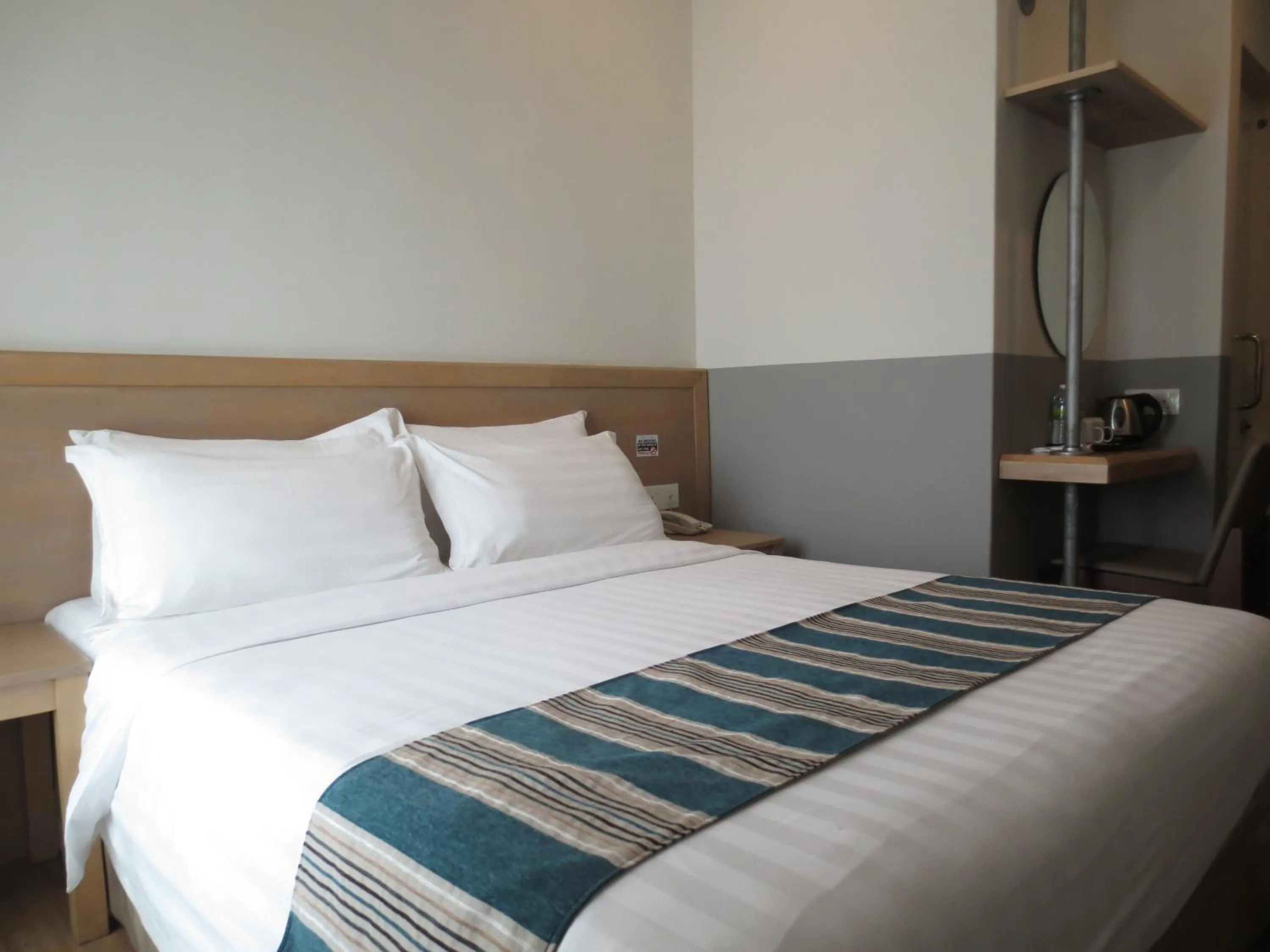 Bed in The Explorer Hotel