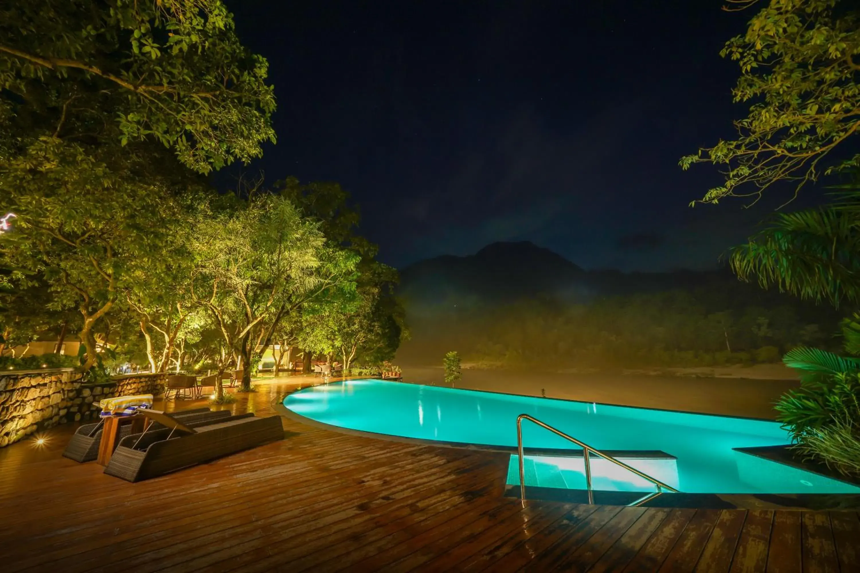 Swimming pool in Anand Kashi by the Ganges Rishikesh - IHCL Seleqtions Swimming pool in Anand Kashi by the Ganges Rishikesh - IHCL Seleqtions