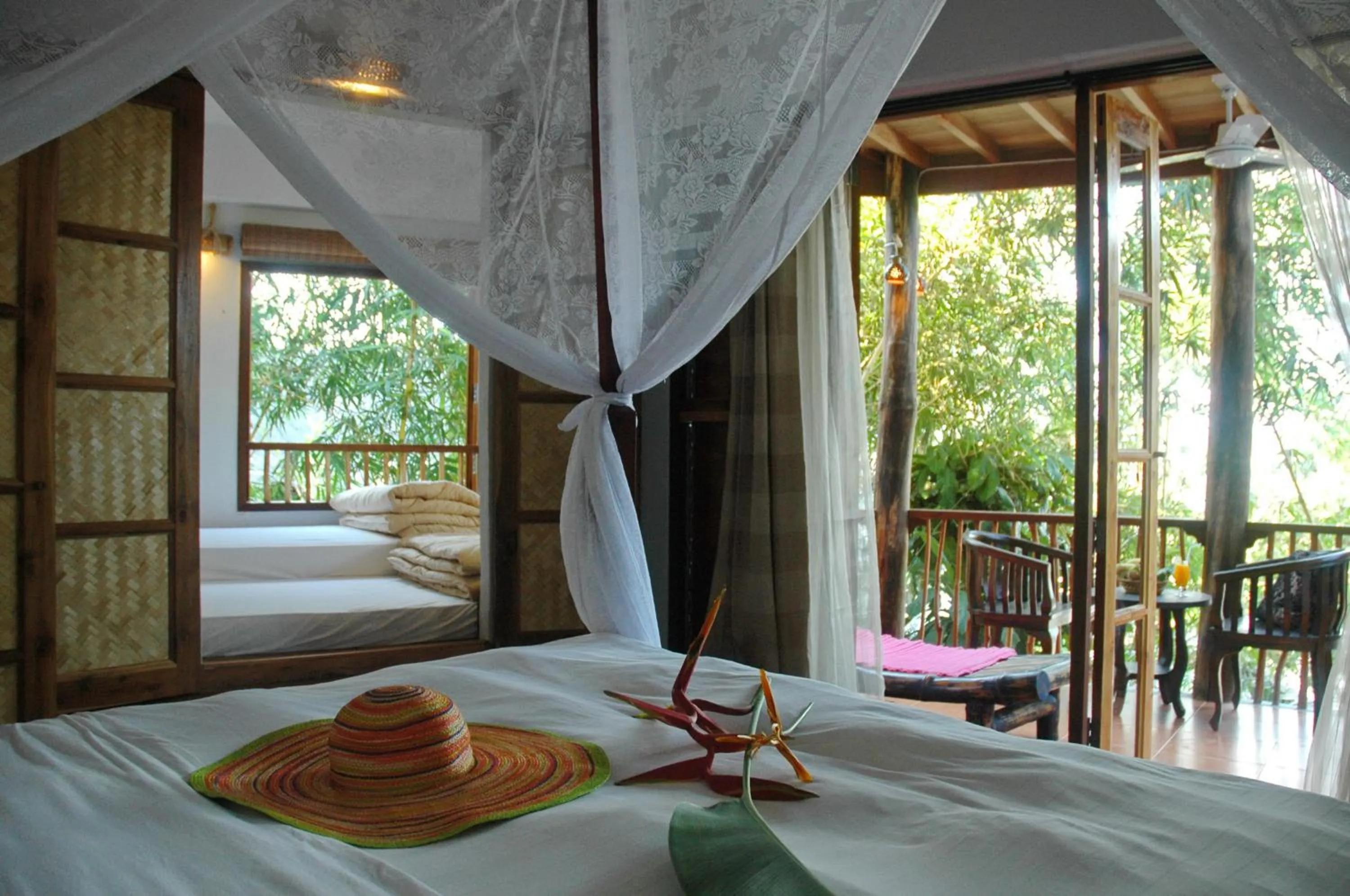 Bed in Koh Mak Cococape Resort