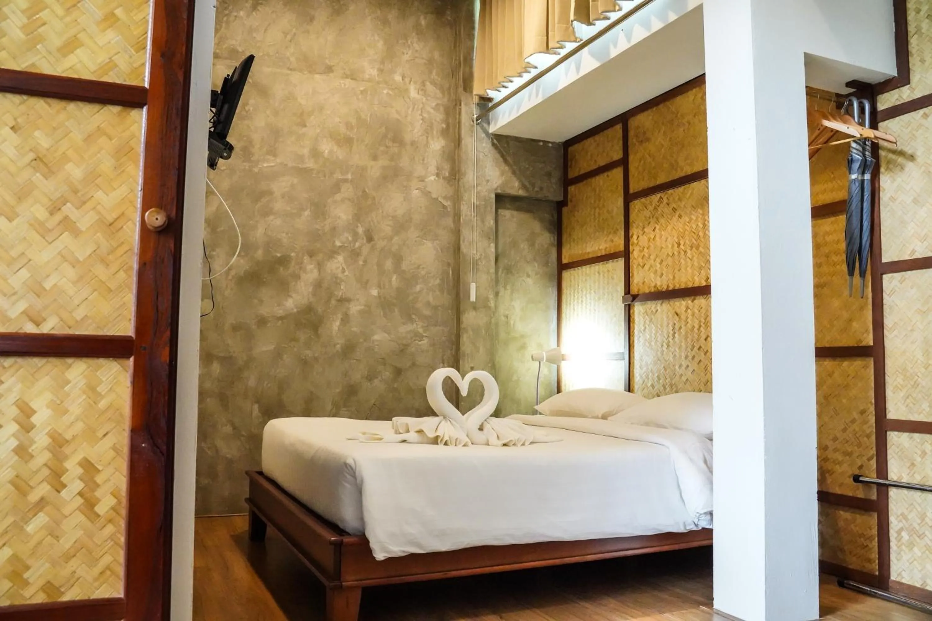 Bed in Koh Mak Cococape Resort