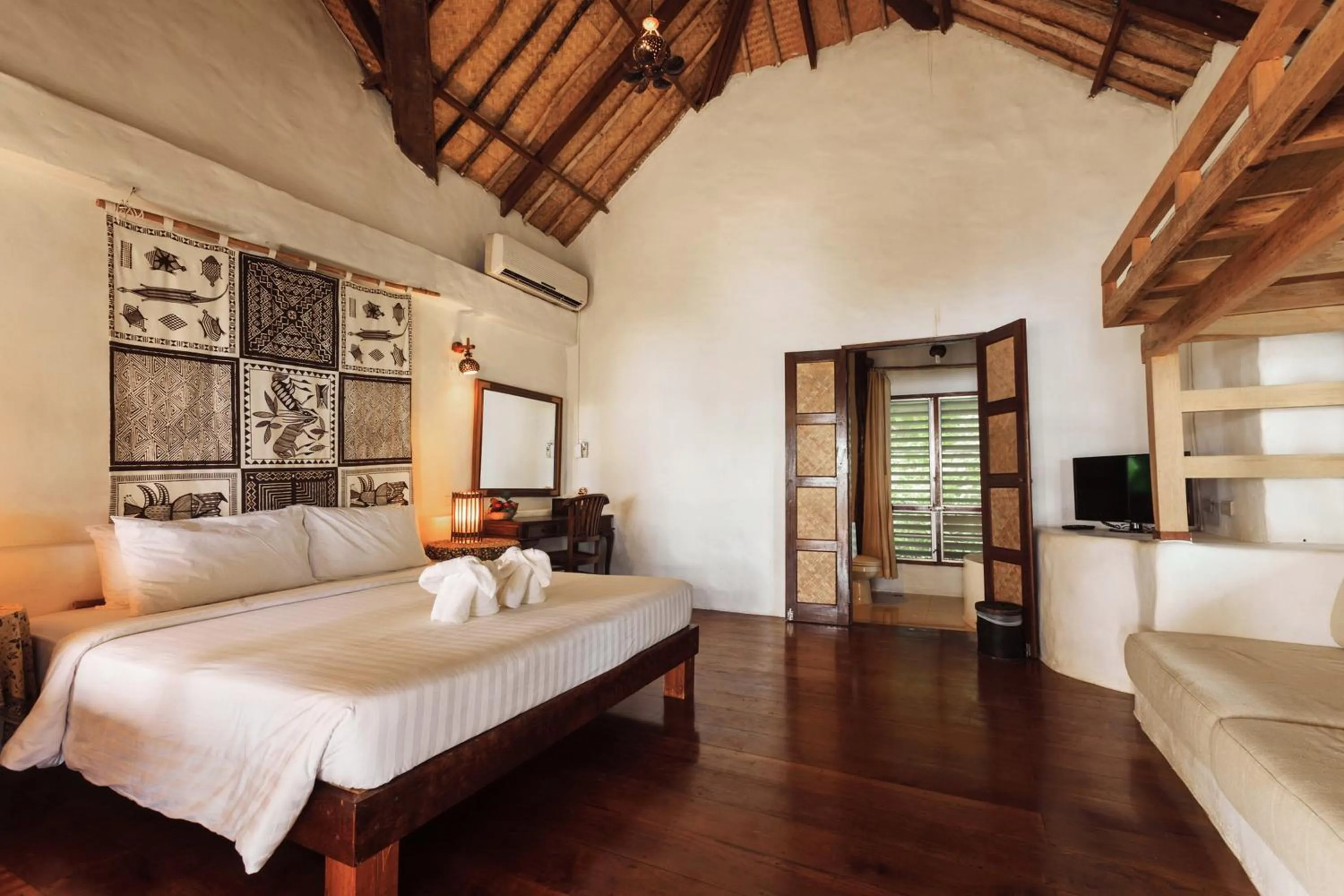 Bed in Koh Mak Cococape Resort