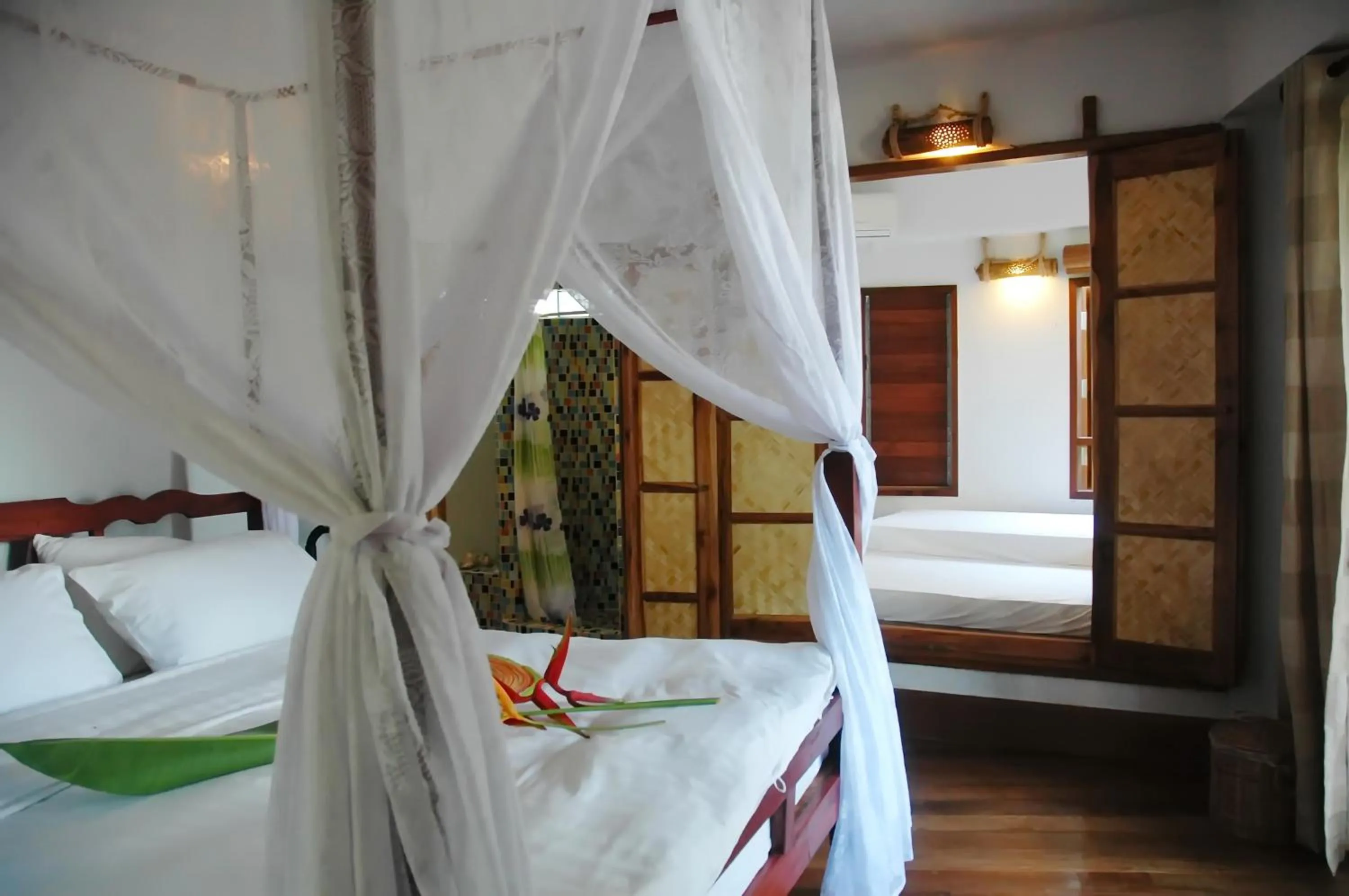 Bed in Koh Mak Cococape Resort