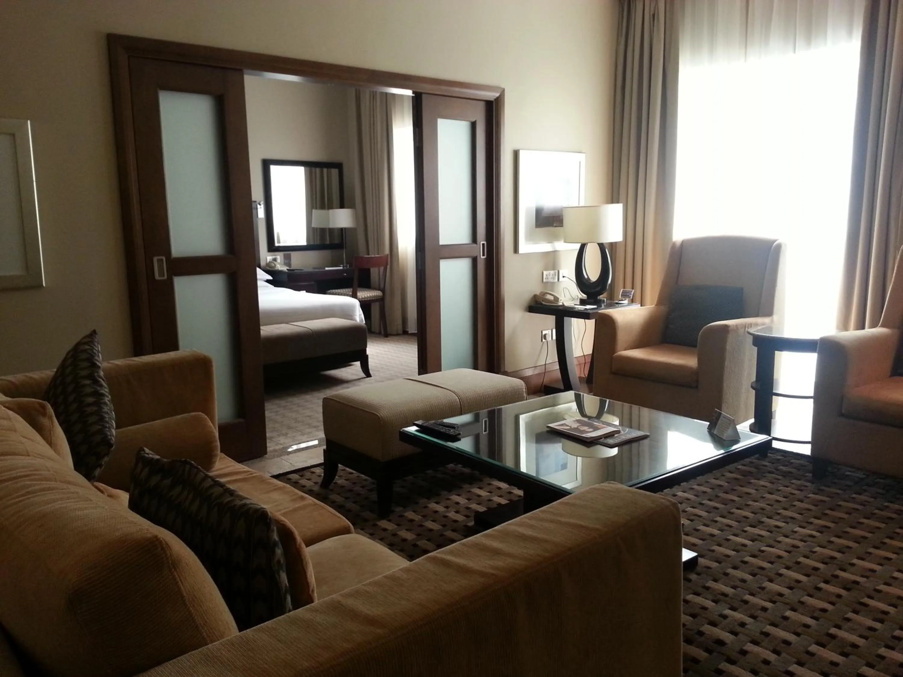 Living room, Bed in Sheraton Khalidiya Hotel