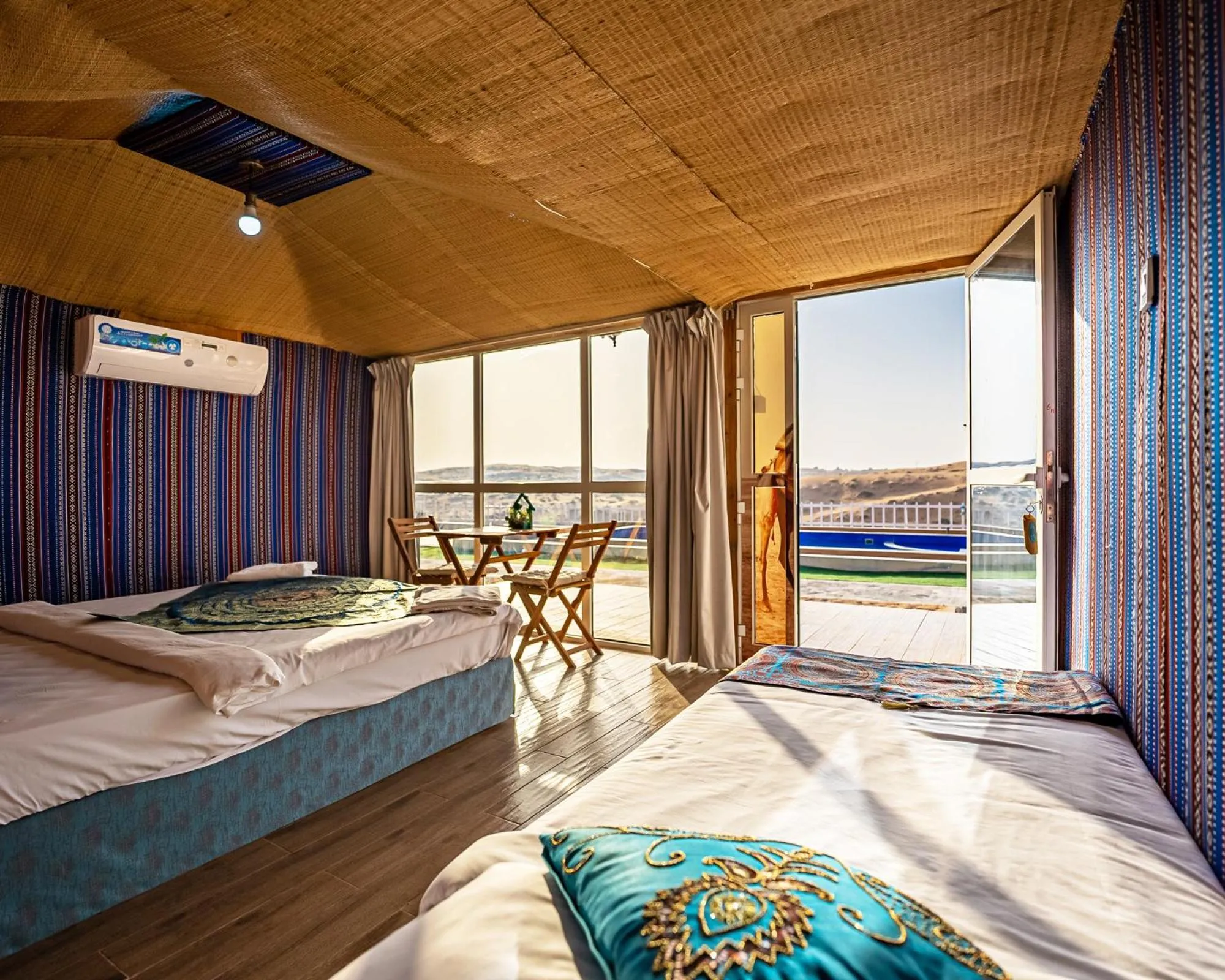 Bed in Bedouin Oasis Desert Camp- Ras Al Khaimah