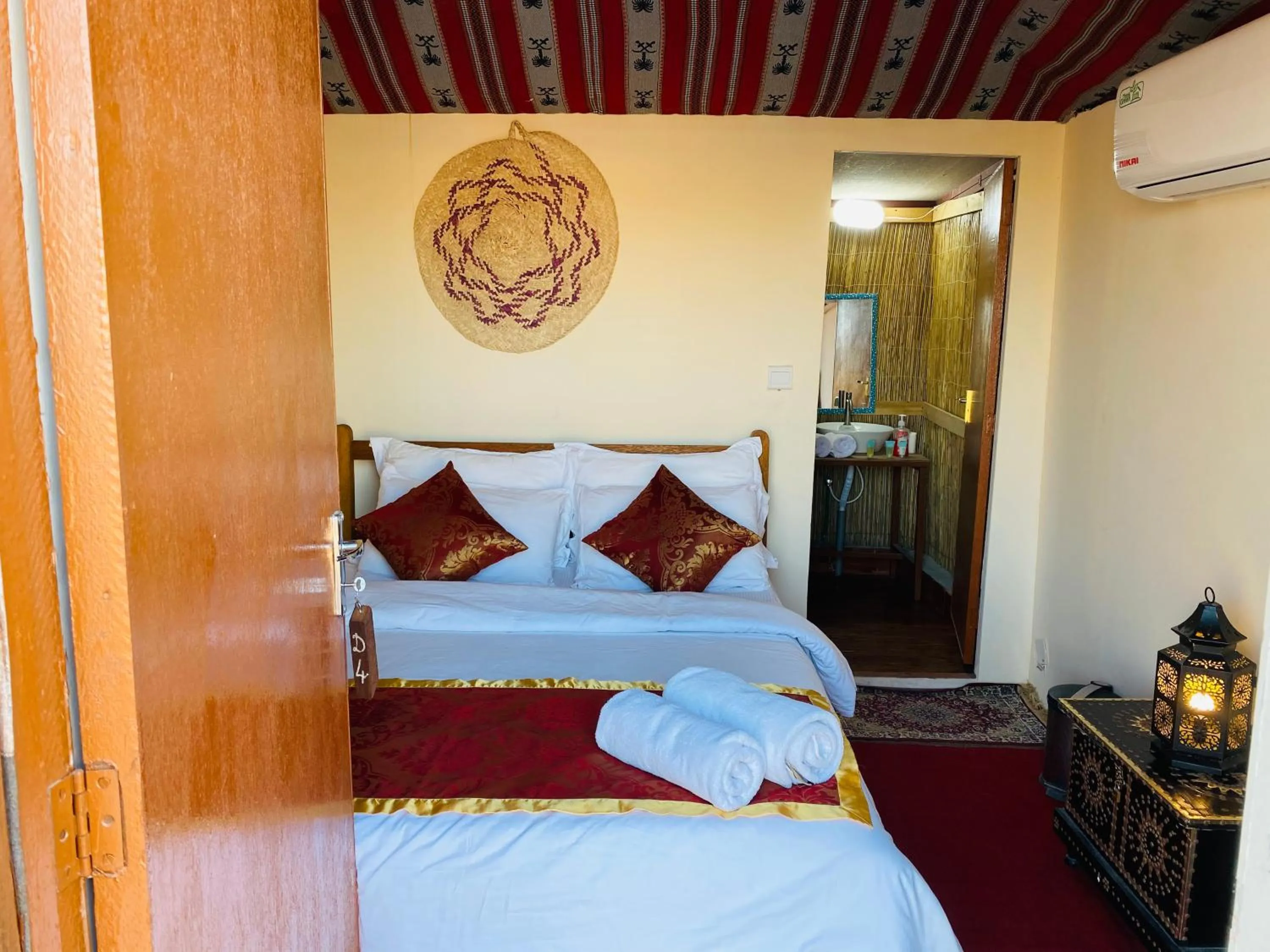 Bed in Bedouin Oasis Desert Camp- Ras Al Khaimah