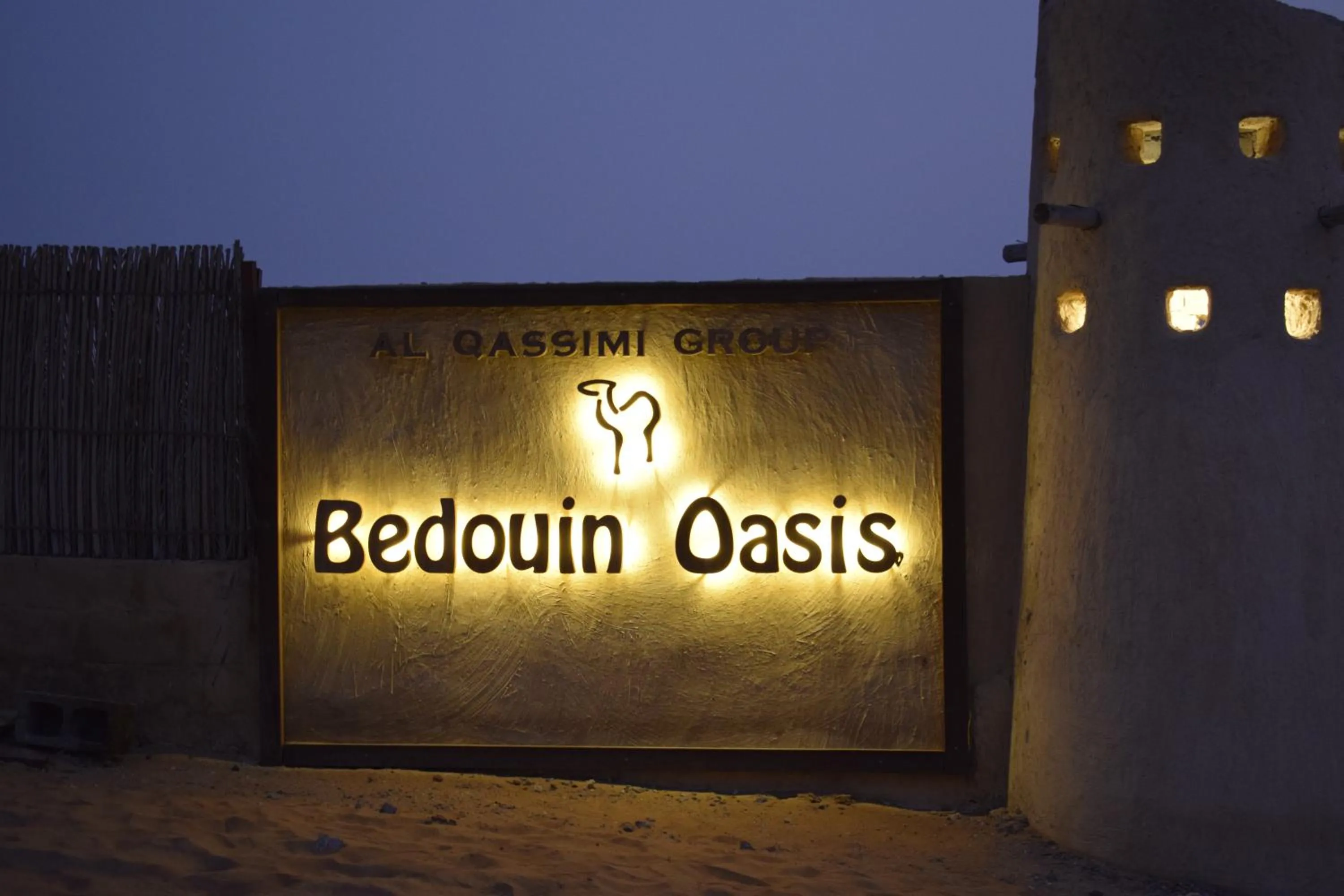 Property logo or sign in Bedouin Oasis Desert Camp- Ras Al Khaimah