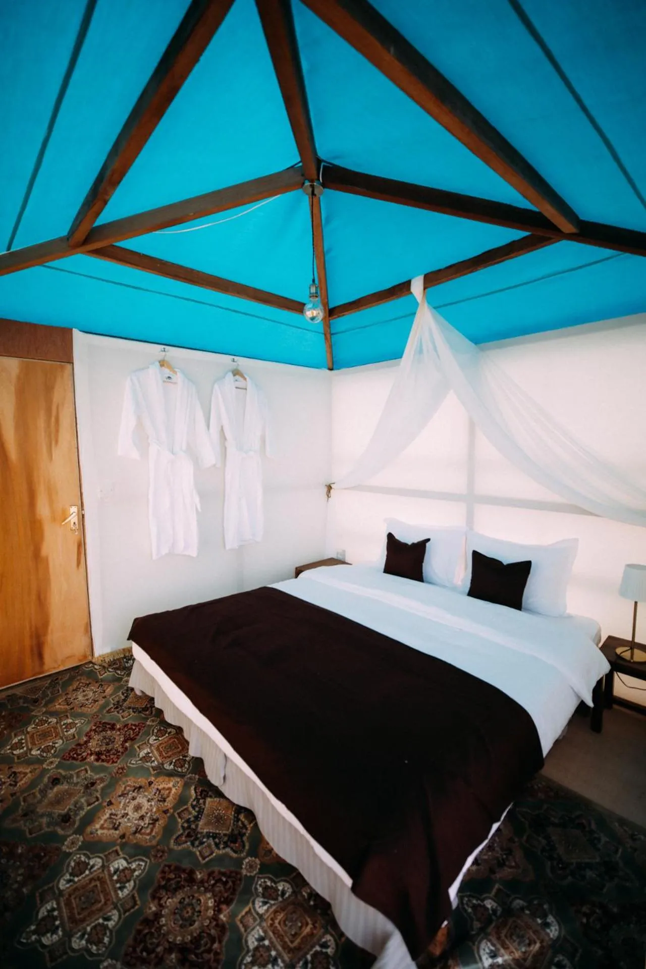 Bed in Bedouin Oasis Desert Camp- Ras Al Khaimah