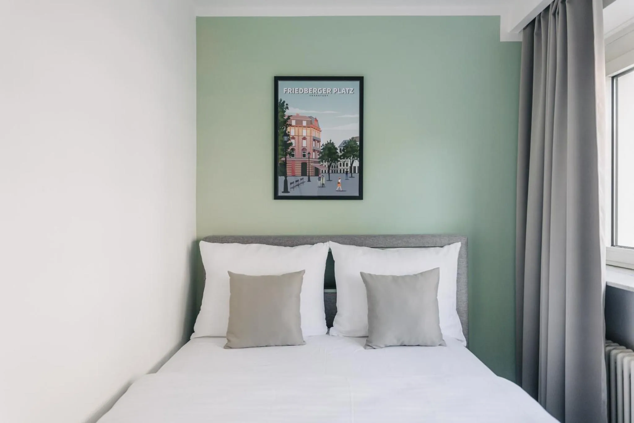 Bed in Homaris Apartments Frankfurt