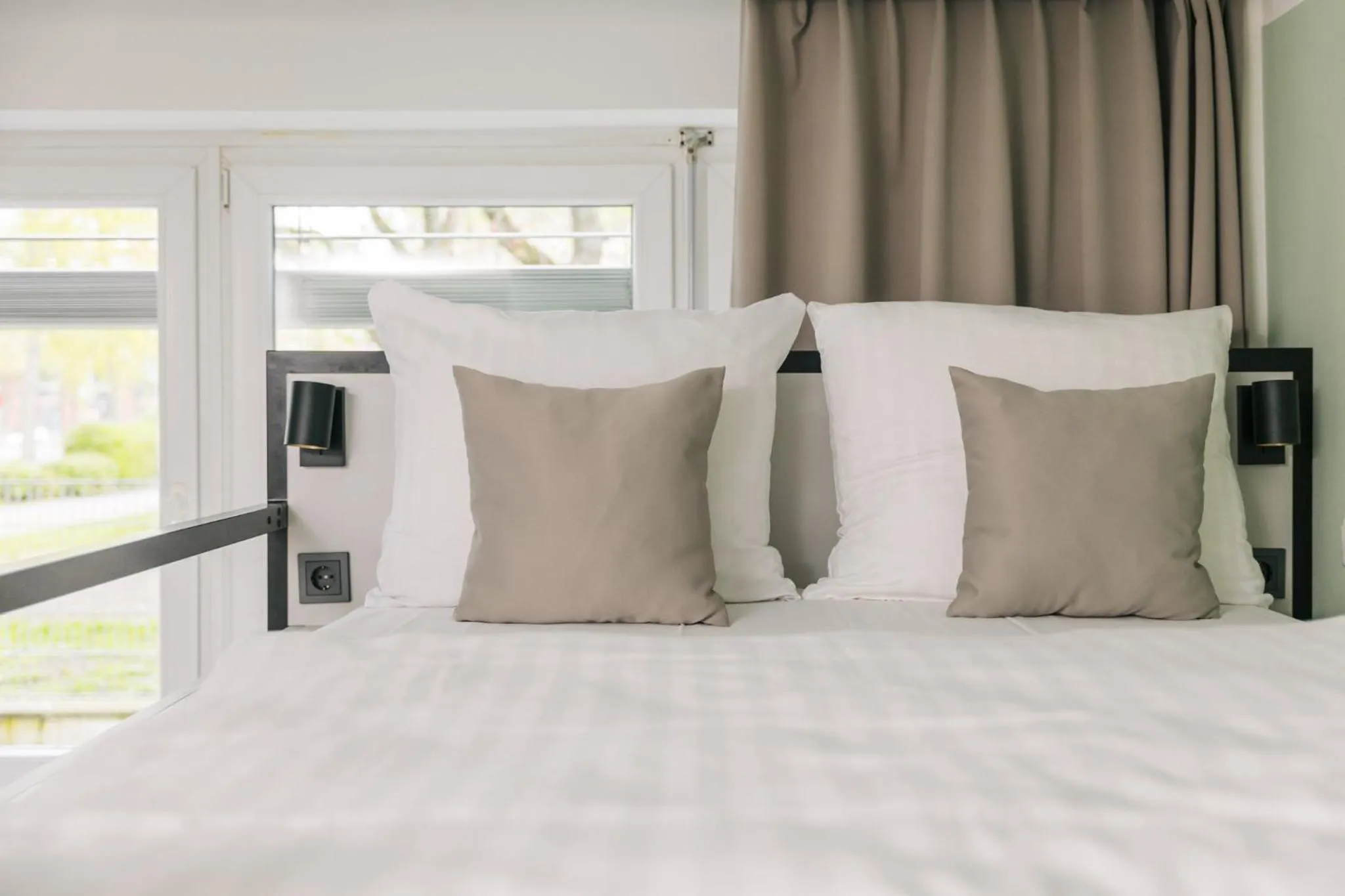 Bed in Homaris Apartments Frankfurt