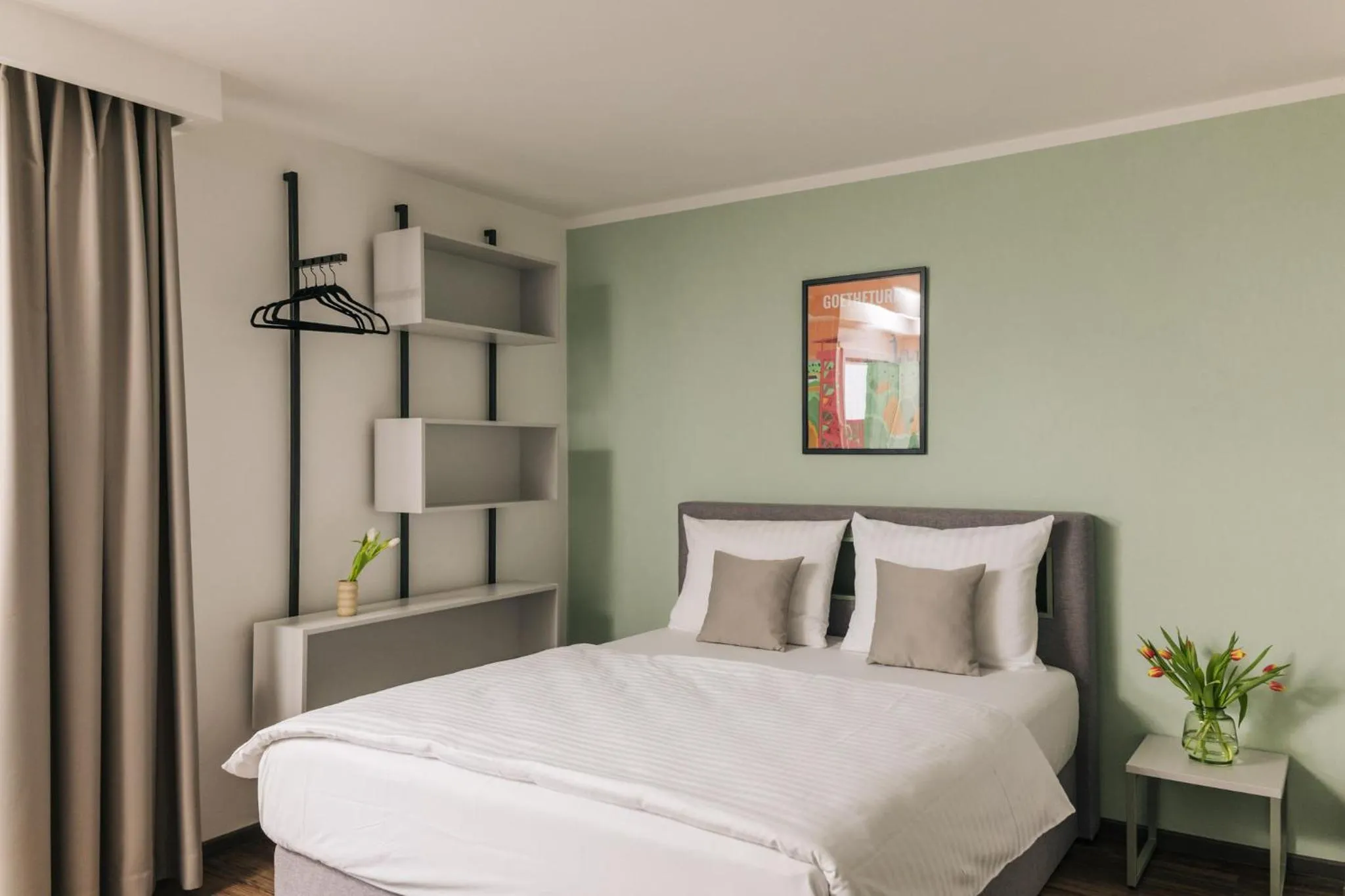 Bed in Homaris Apartments Frankfurt