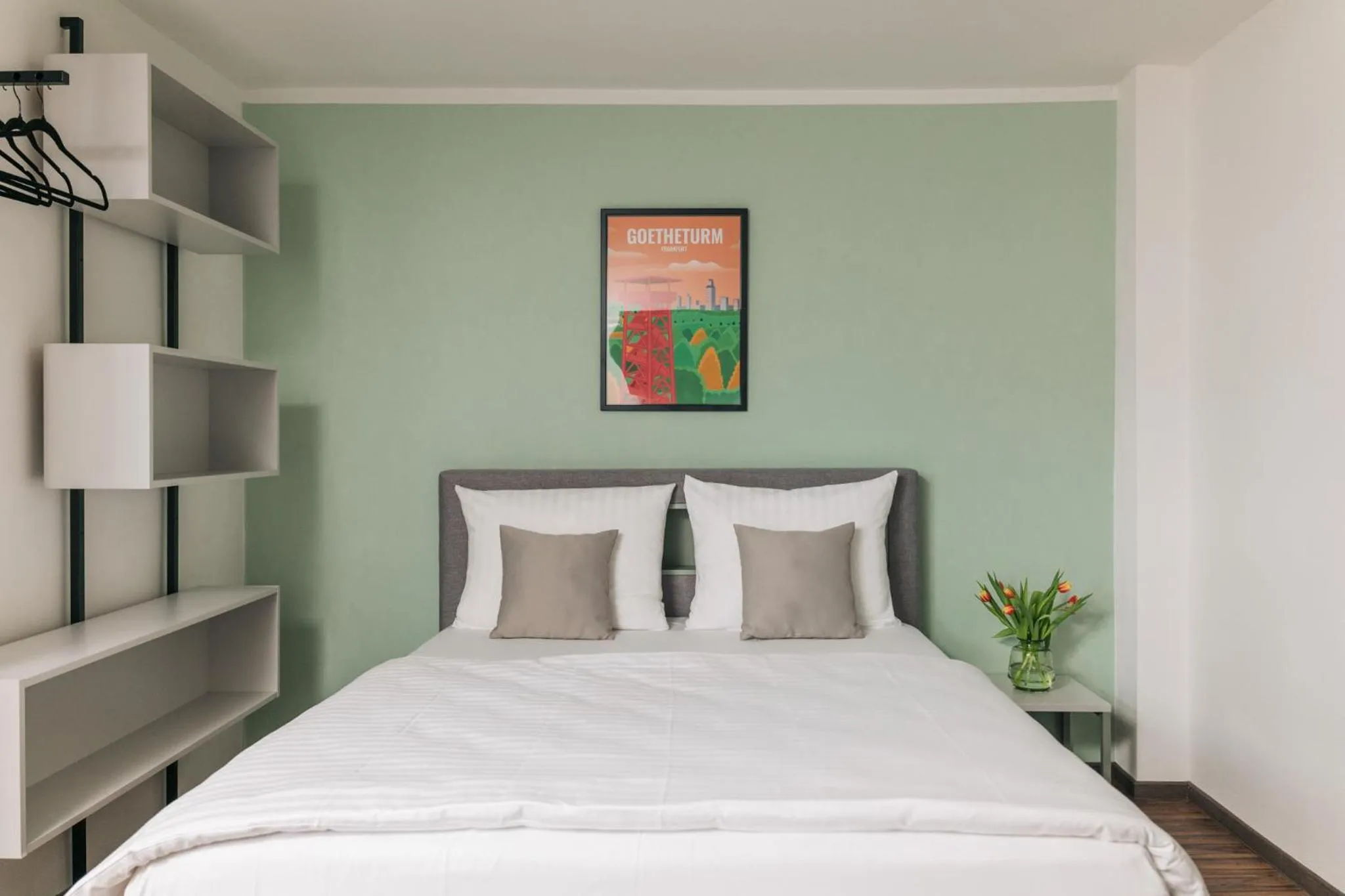 Bed in Homaris Apartments Frankfurt