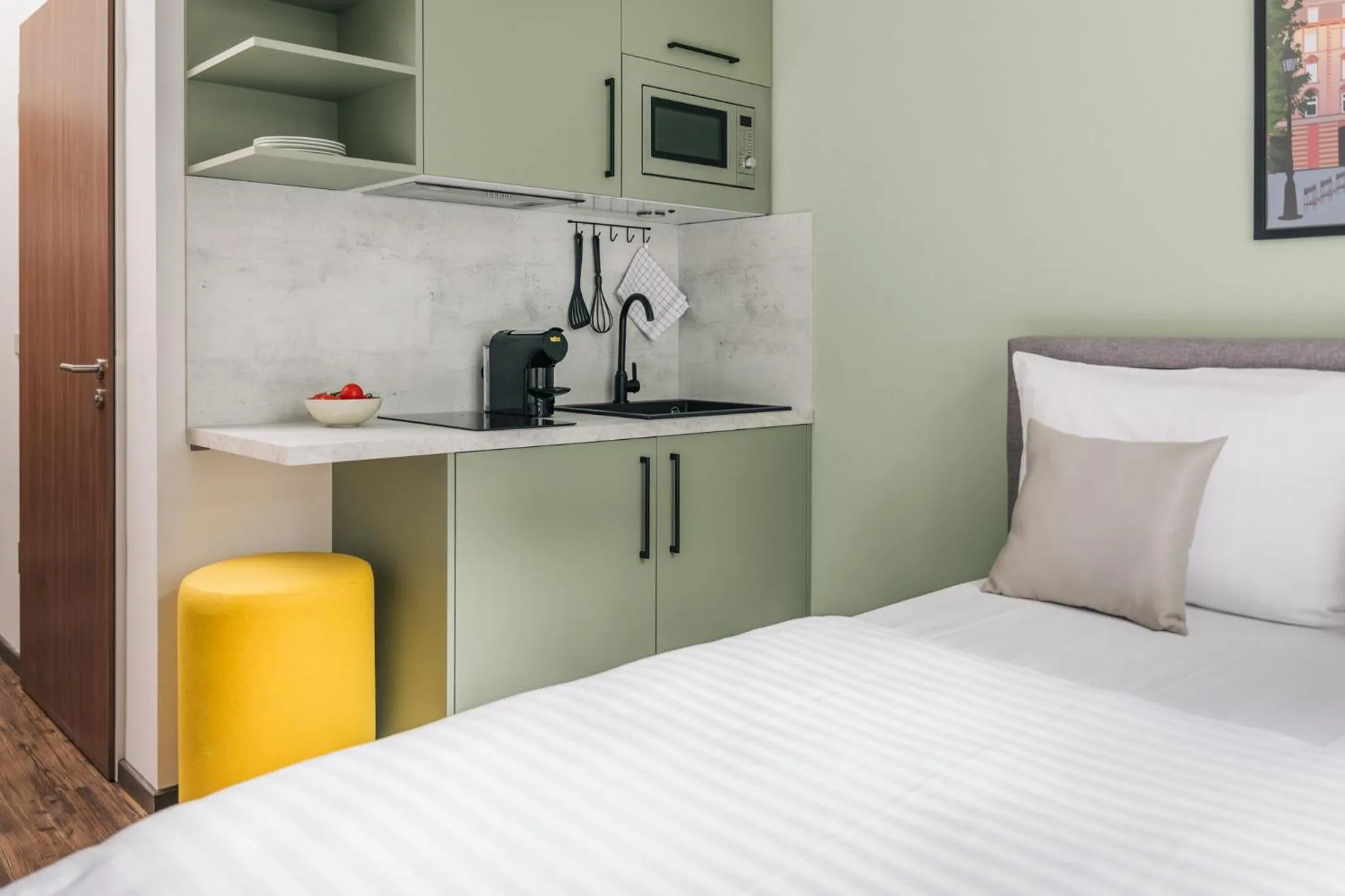 Bed in Homaris Apartments Frankfurt